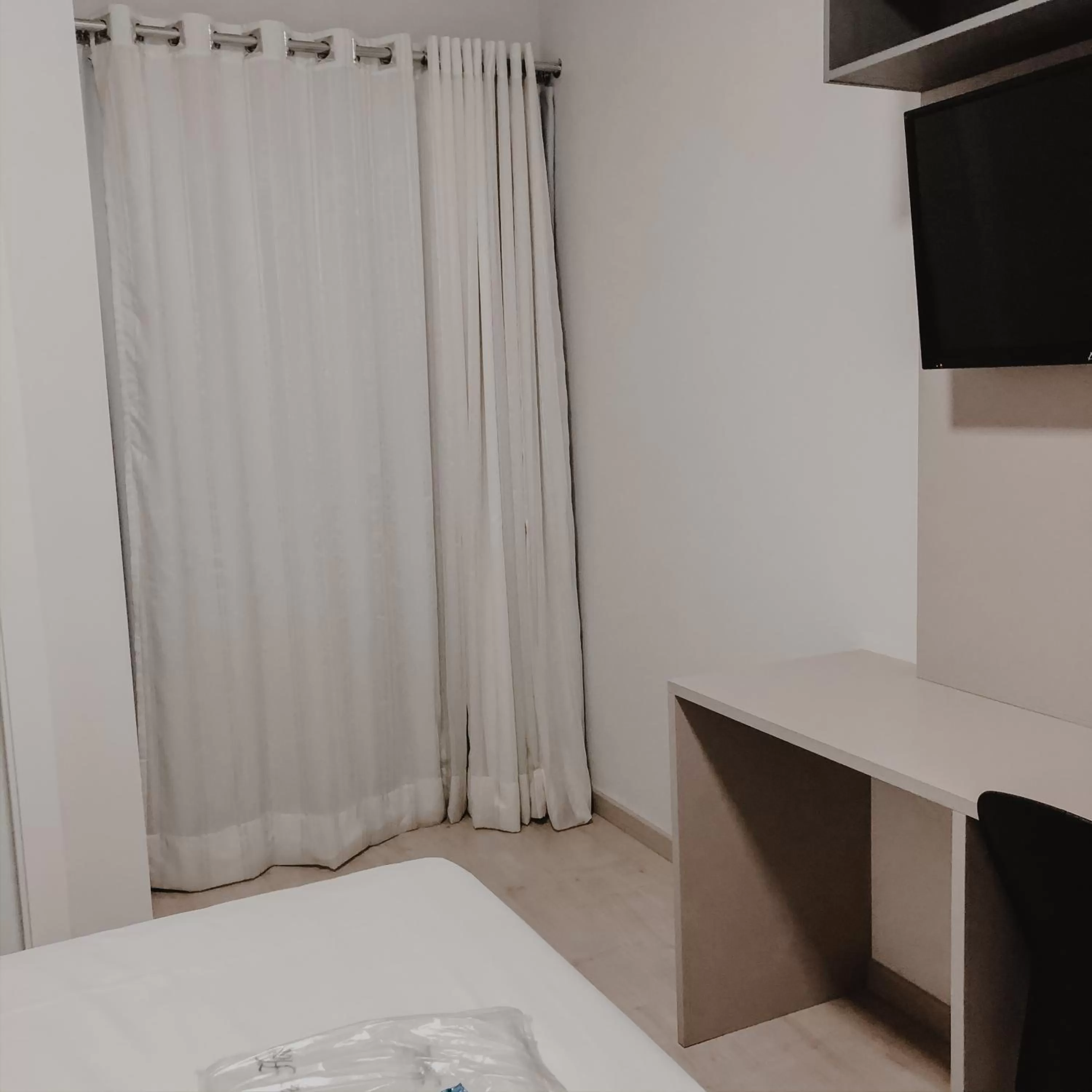 Bed in Petri Plaza Hotel