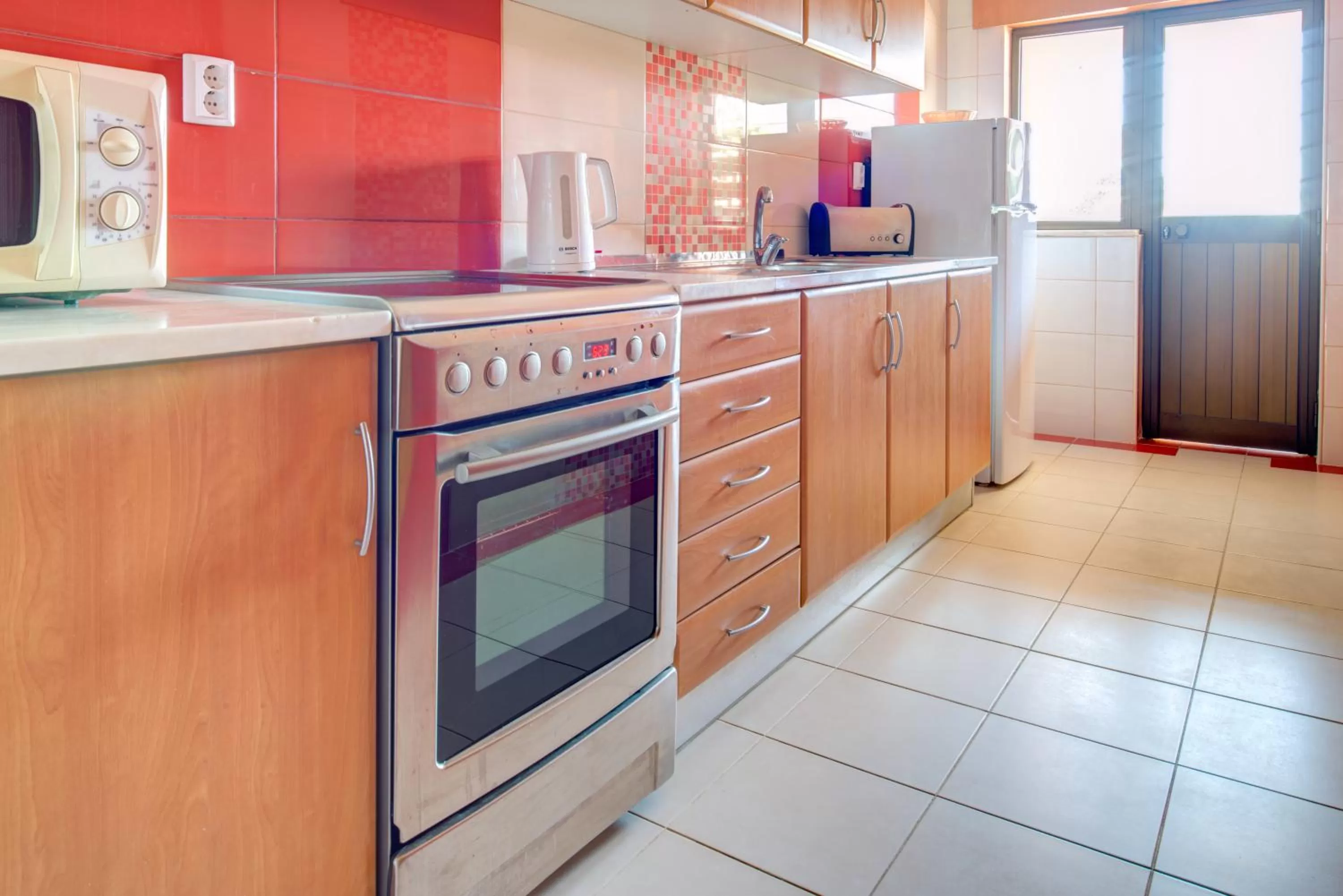 Kitchen or kitchenette in Choromar Apartments