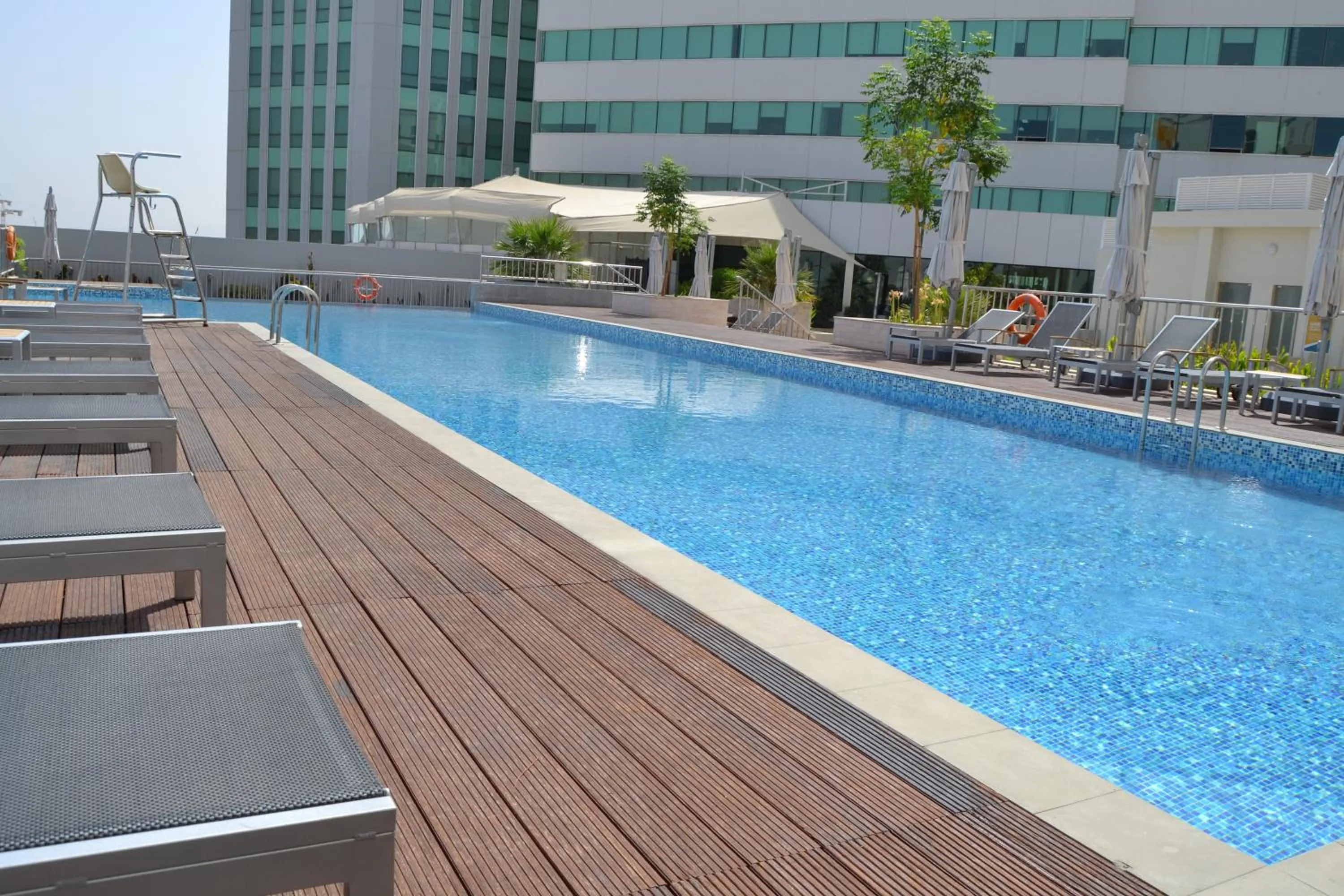 Swimming pool in Millennium Executive Apartments Muscat