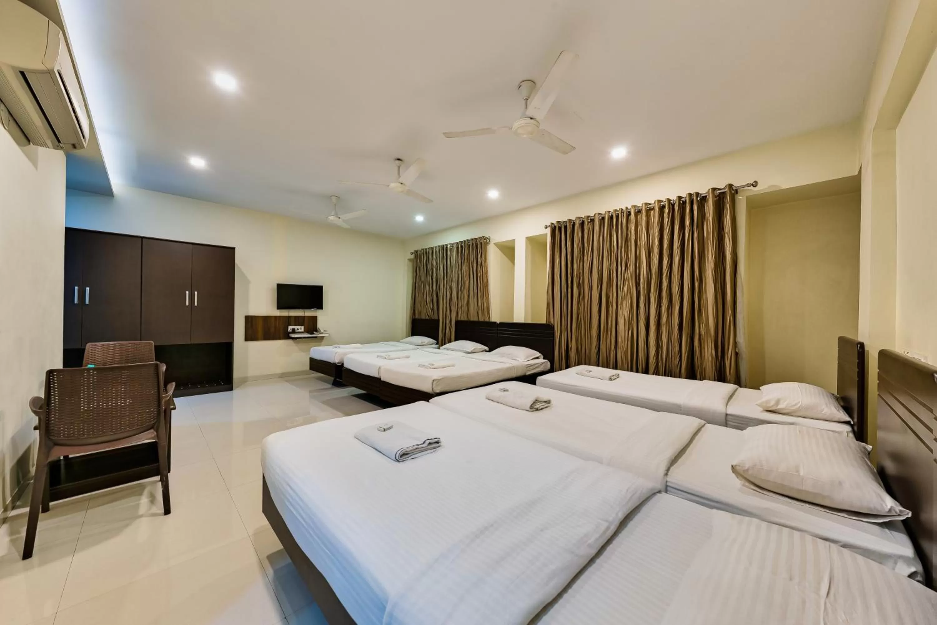 Photo of the whole room, Bed in Hotel Galaxy Inn Kolhapur
