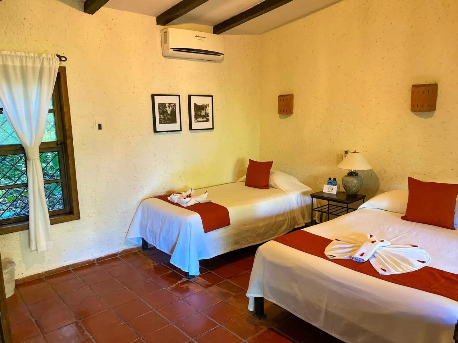 Bed in Hotel Maya Bell