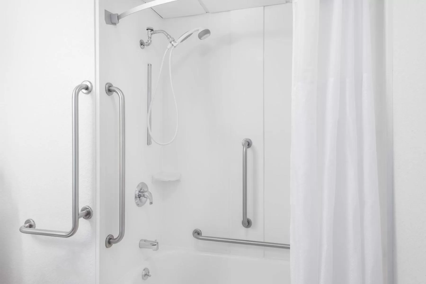 Shower in Super 8 by Wyndham Portland/Westbrook Area