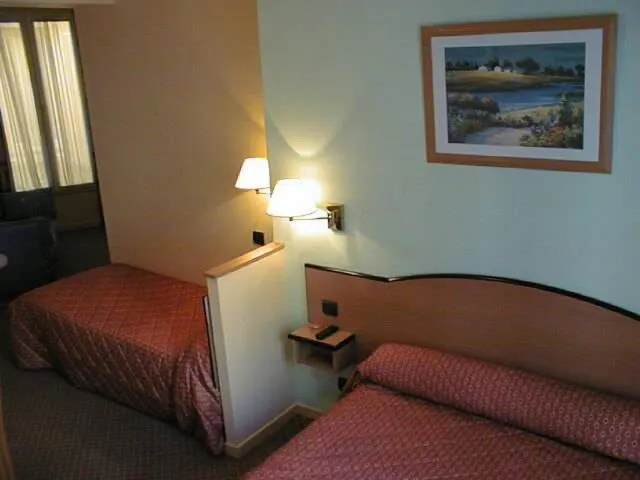 Bed in Hotel Ferney République