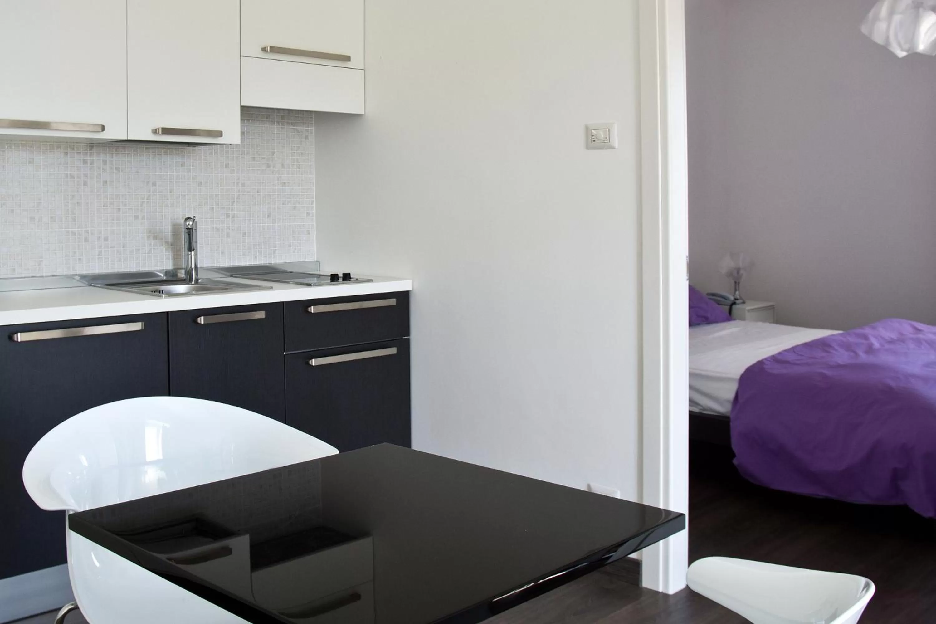 Kitchen or kitchenette, Bed in Hotel Cave Del Sole