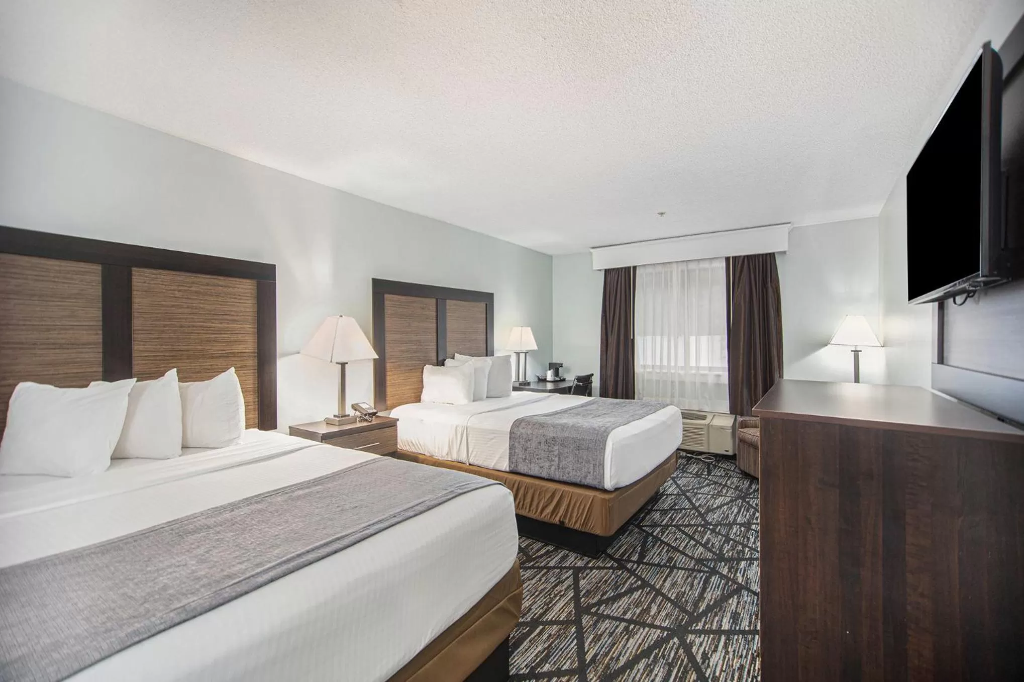 Bed in Baymont by Wyndham Grand Haven