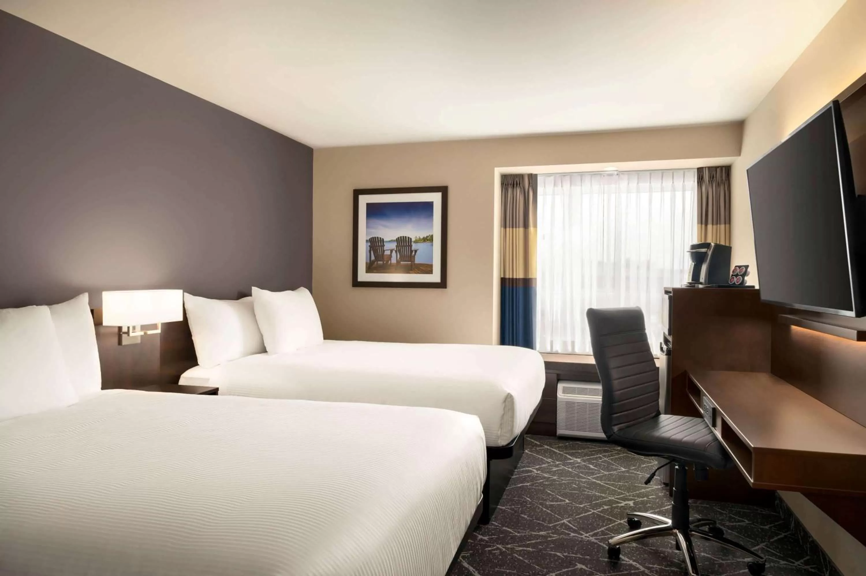 Photo of the whole room, Bed in Microtel Inn & Suites by Wyndham Aurora