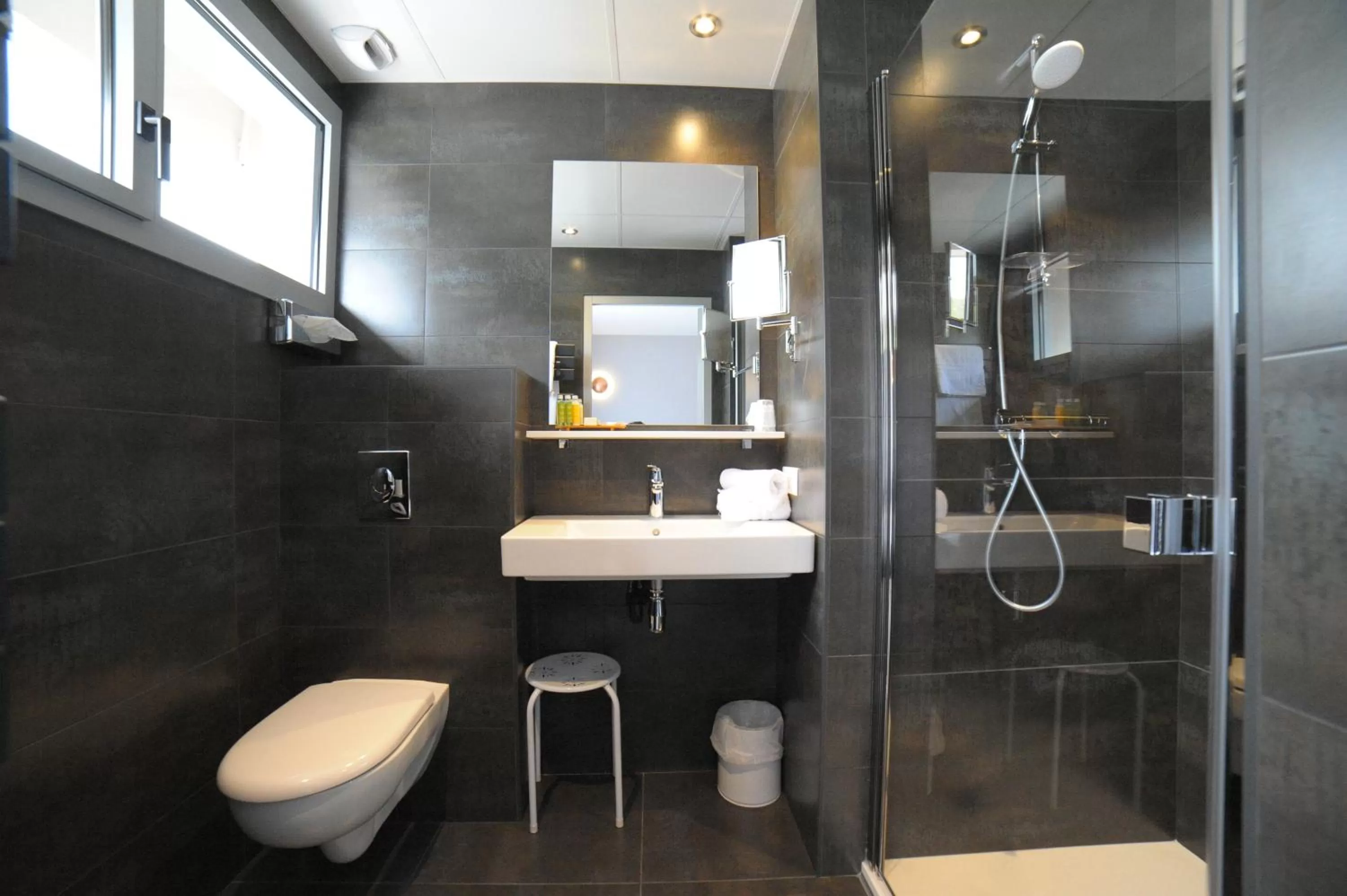 Bathroom in Cit'Hotel L'Etape