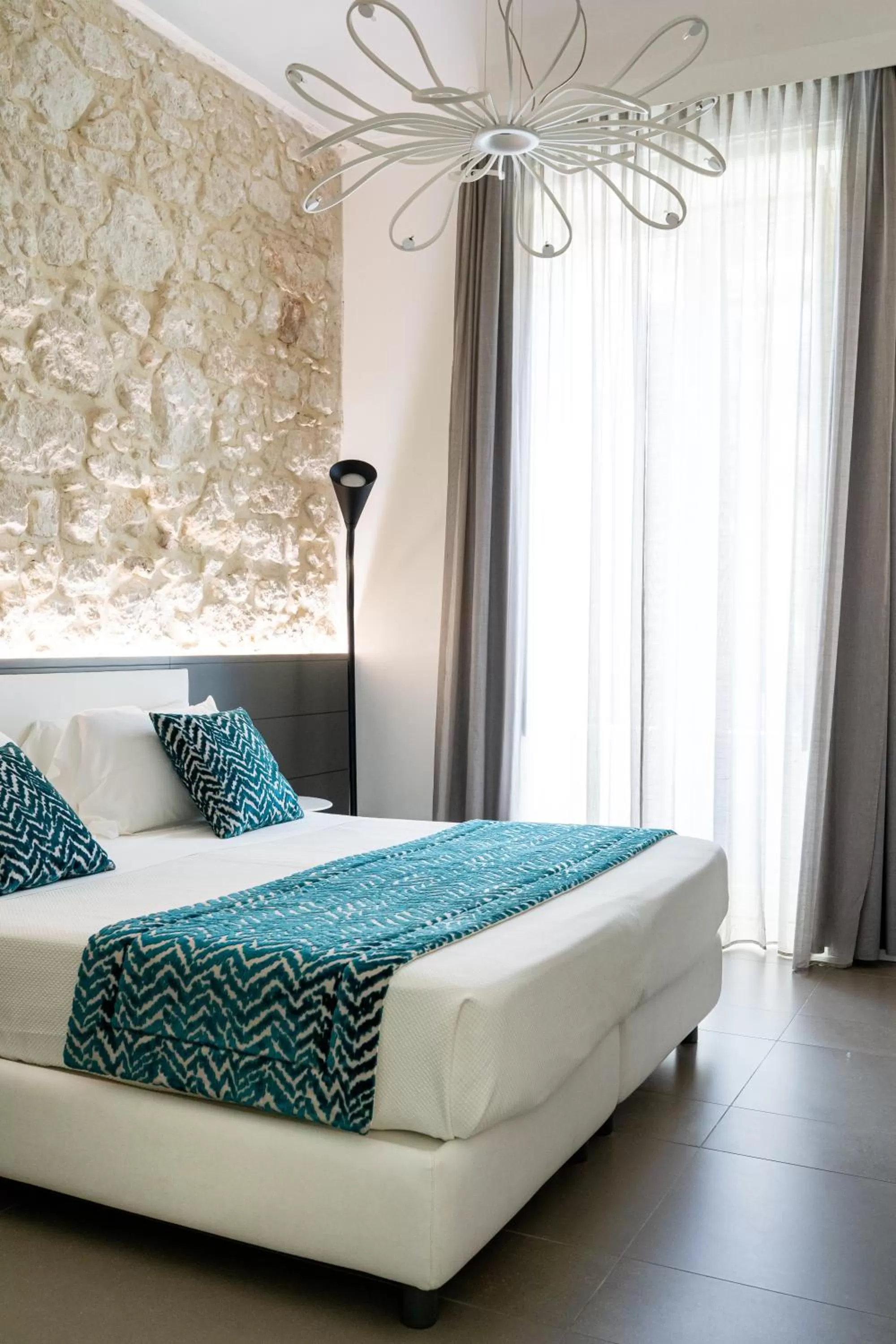 Bed in Caportigia Boutique Hotel