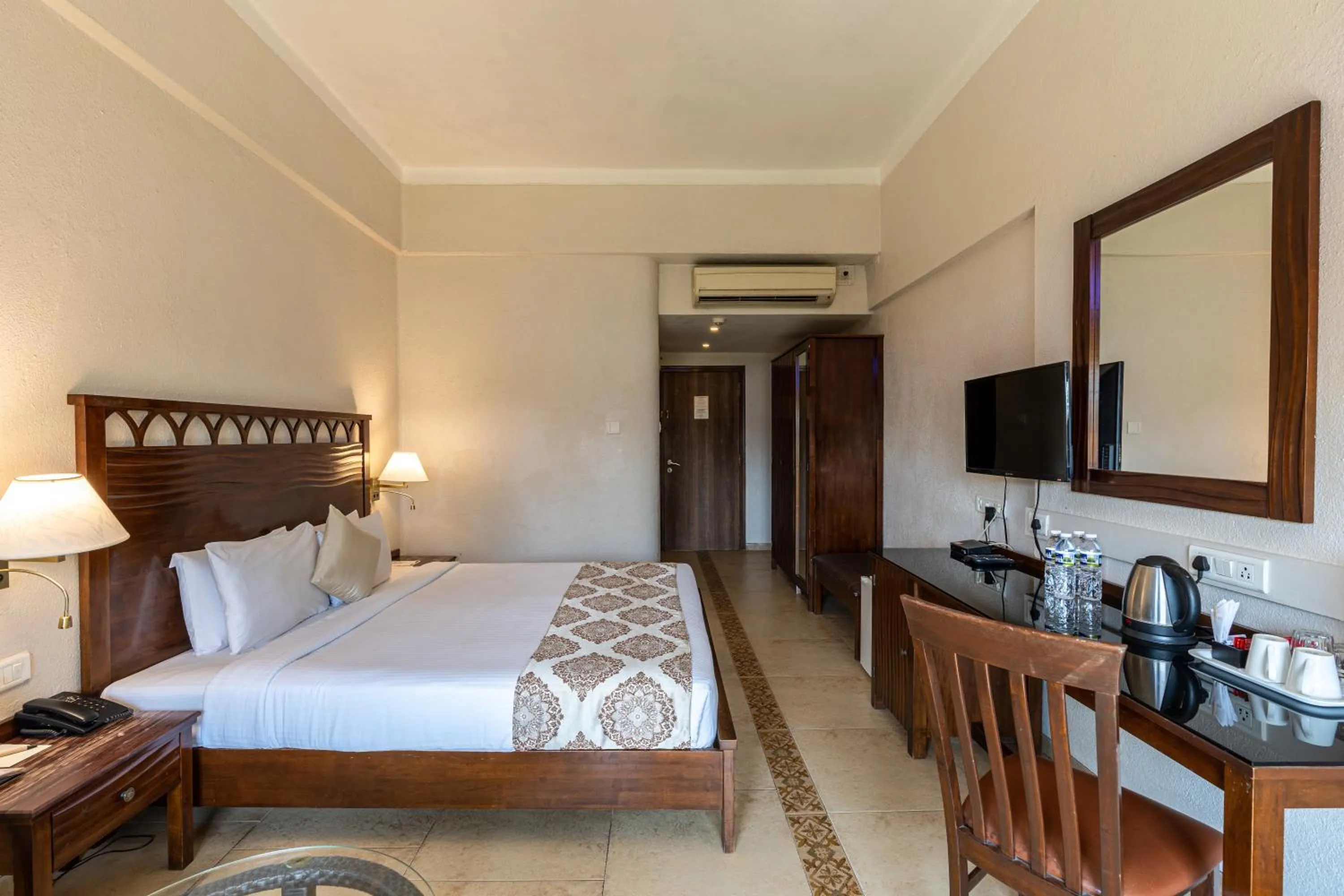 Bed in Neelam's The Grand Hotel Goa