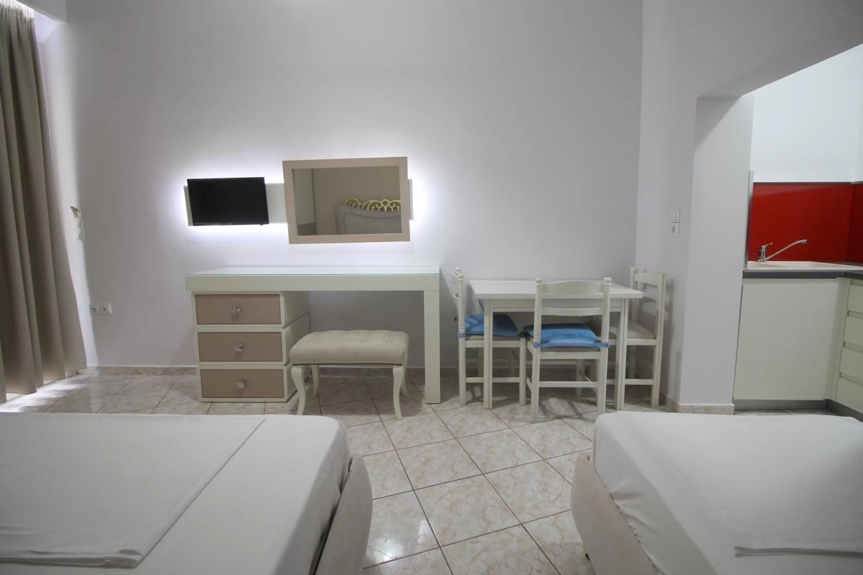 Bed in Murati Suites Sarandë