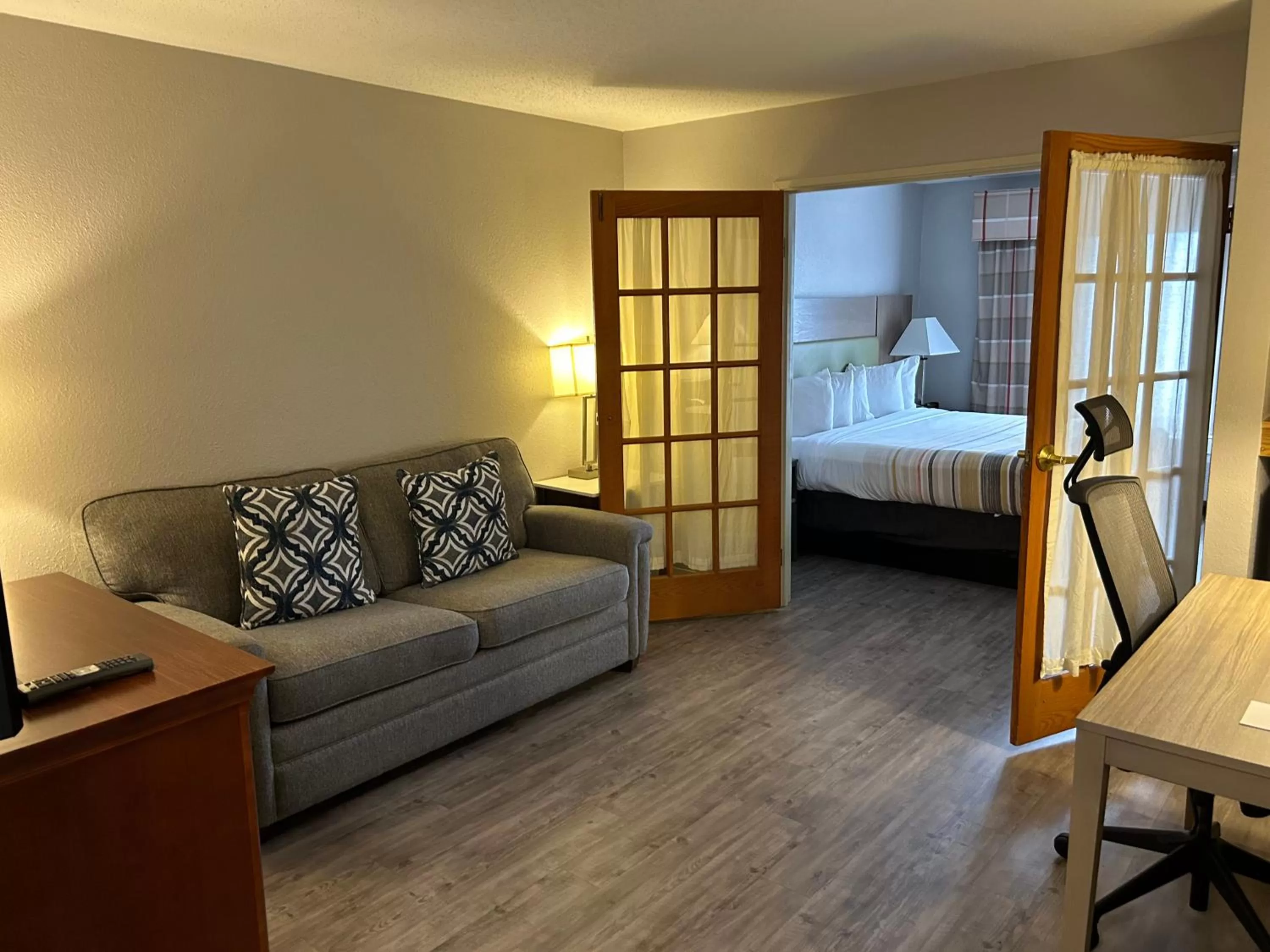 Bed in Country Inn & Suites by Radisson, Grand Rapids Airport, MI