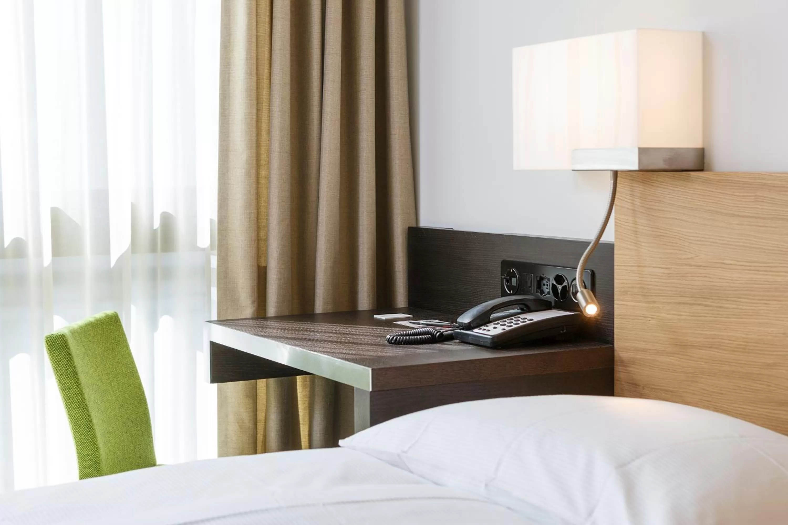 Photo of the whole room, Bed in Züri by Fassbind