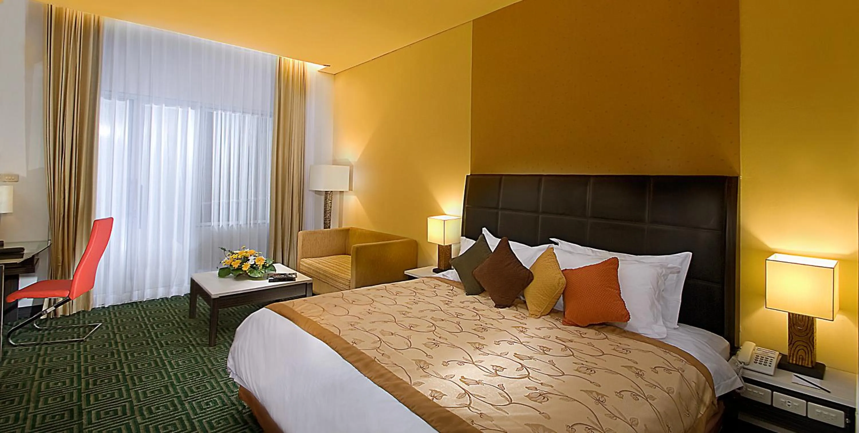 Photo of the whole room, Bed in Golden Flower by KAGUM Hotels