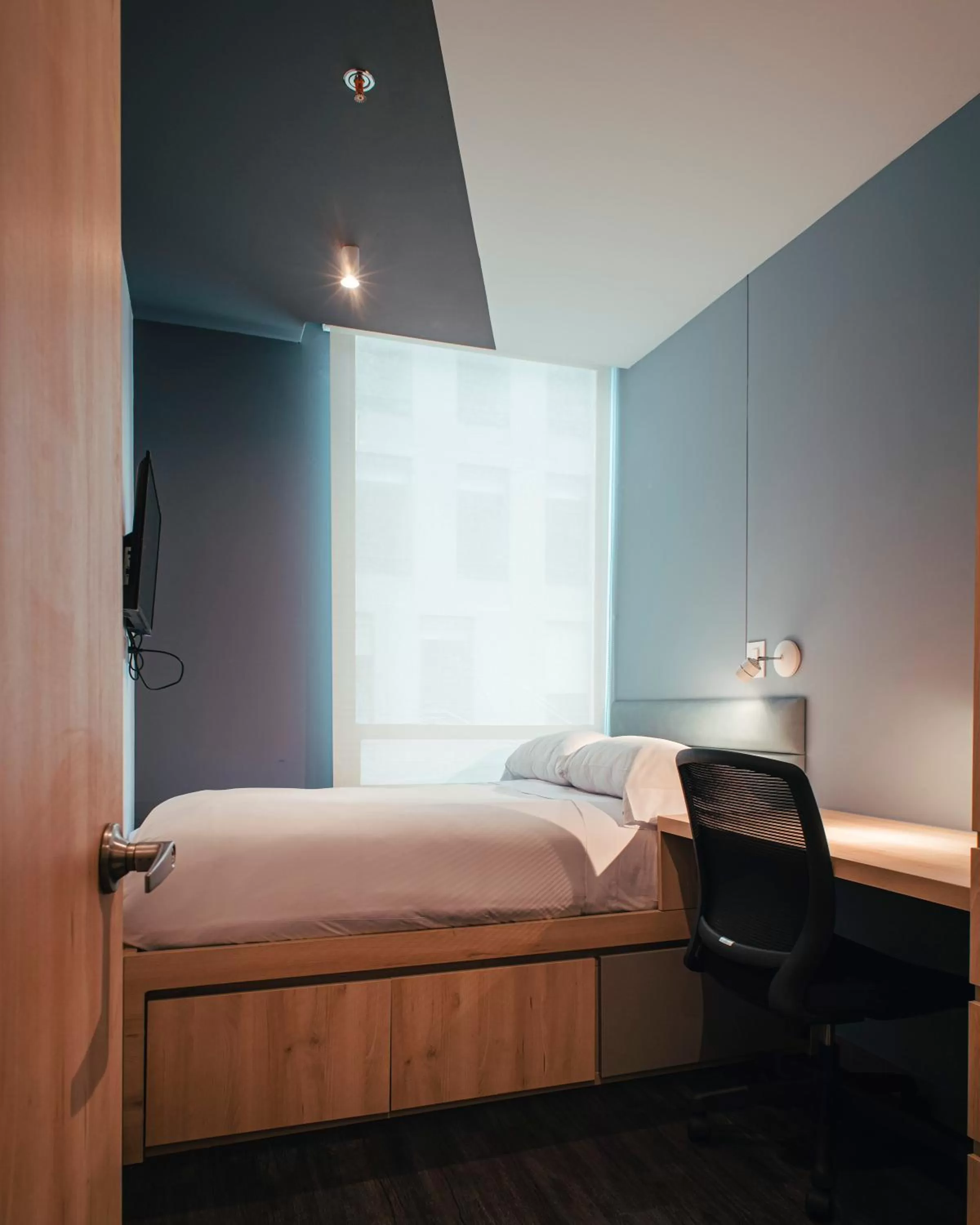 Bed in UMA Suites Chia