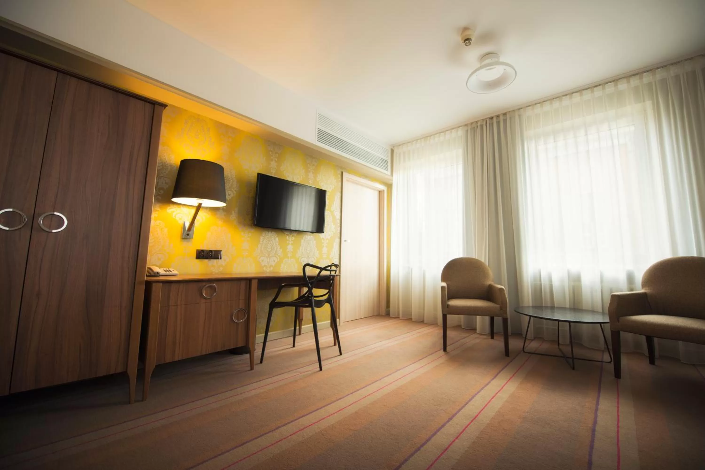 Communal lounge/ TV room in Hotel Cristal Białystok