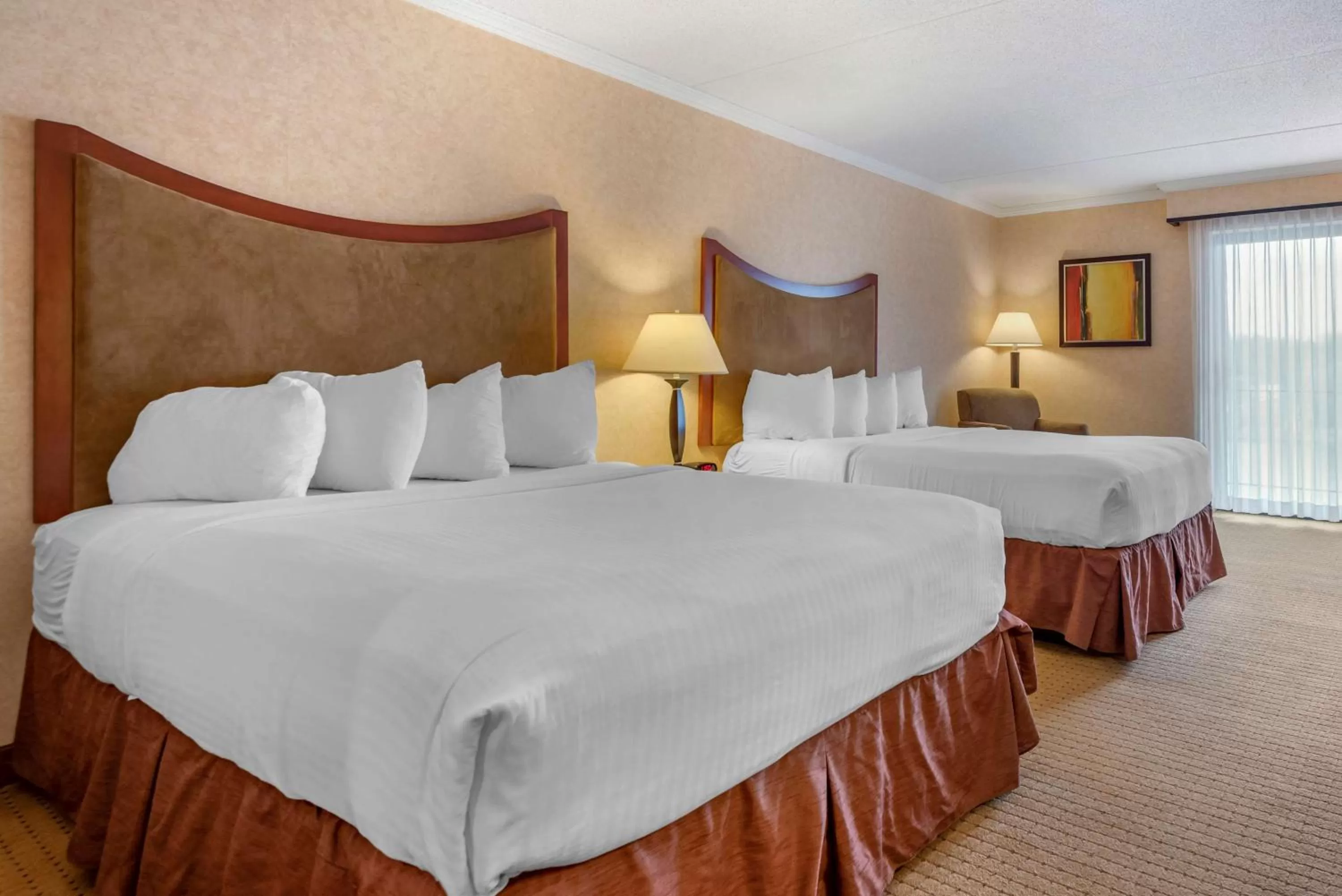 Bed in Best Western Plus Oswego Hotel and Conference Center