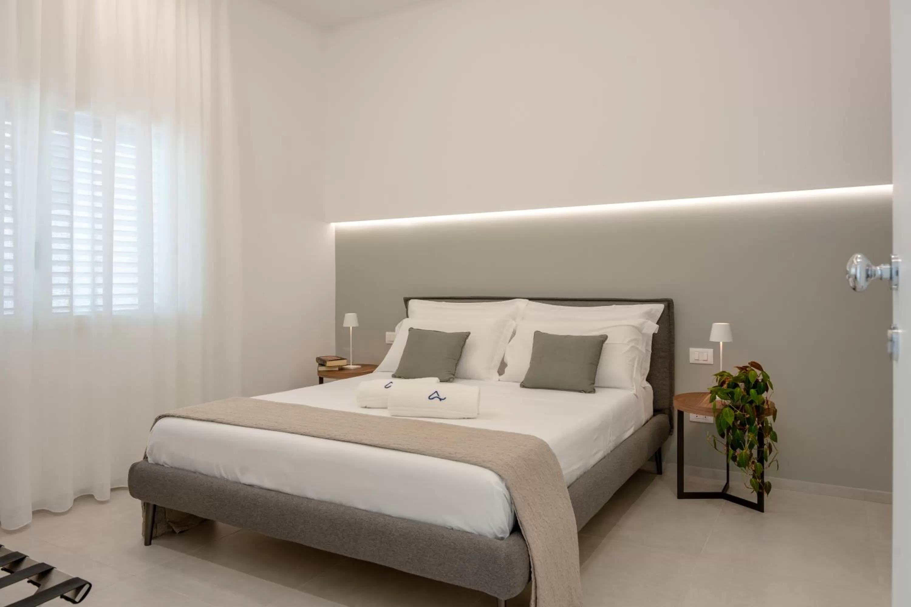 Bed in Daline Holiday Rooms