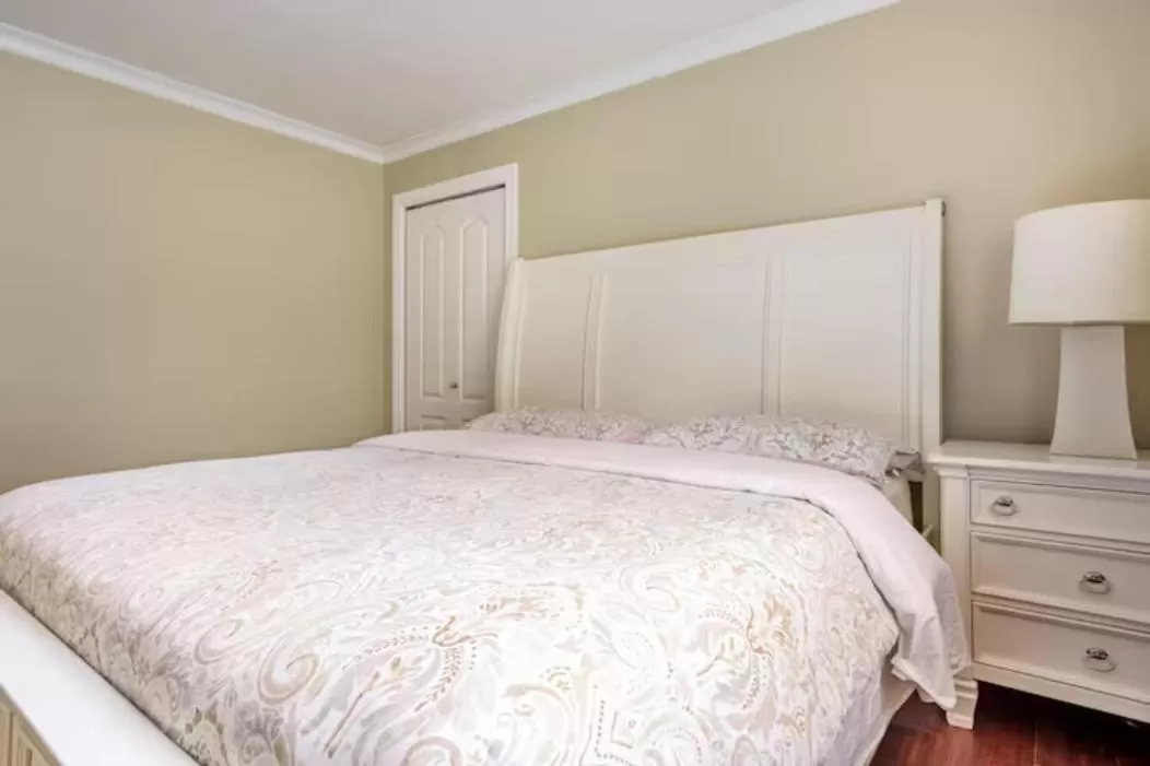 Bedroom, Bed in Jane's private rooms with shared washroom