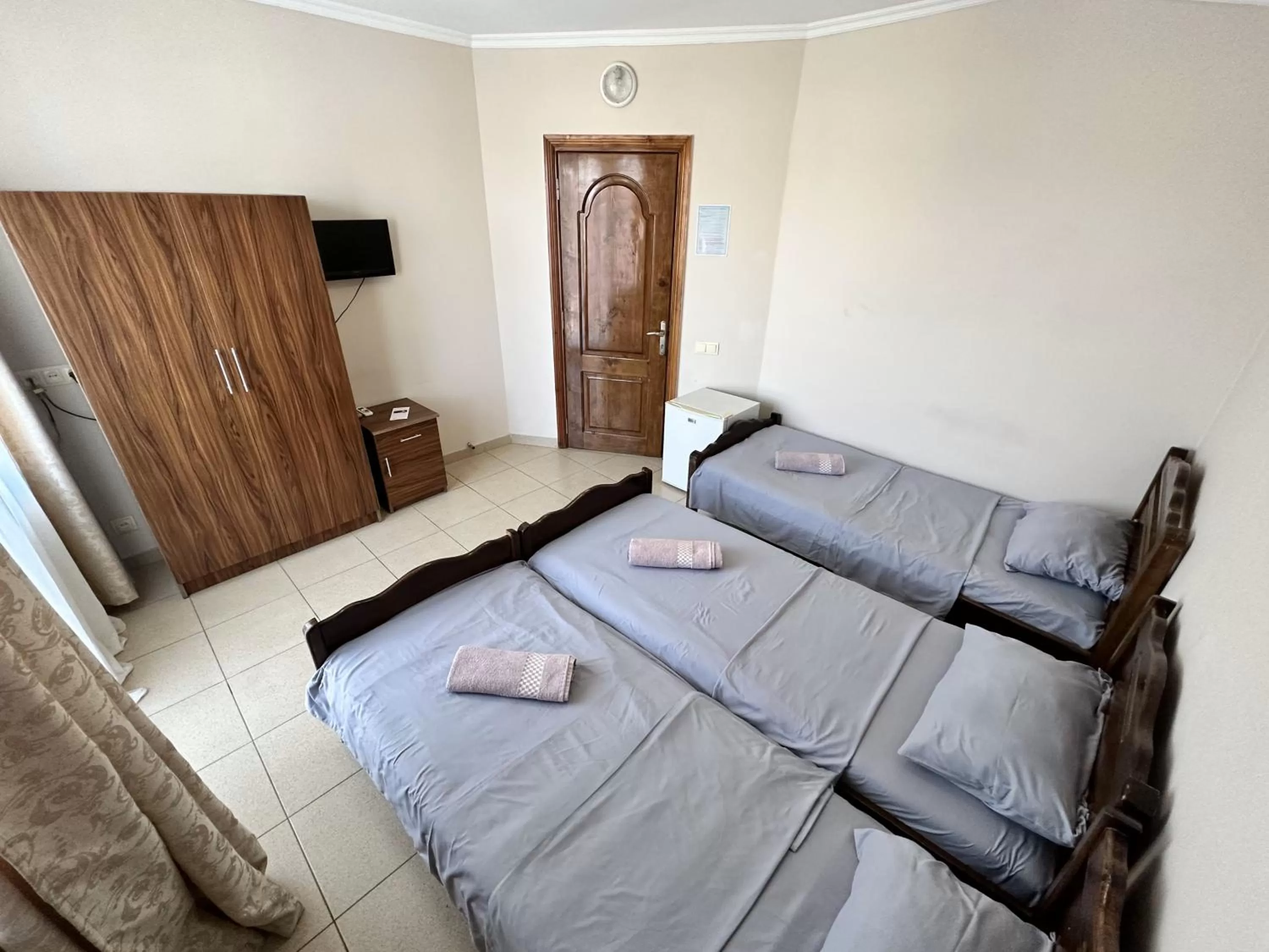 Photo of the whole room, Bed in National+