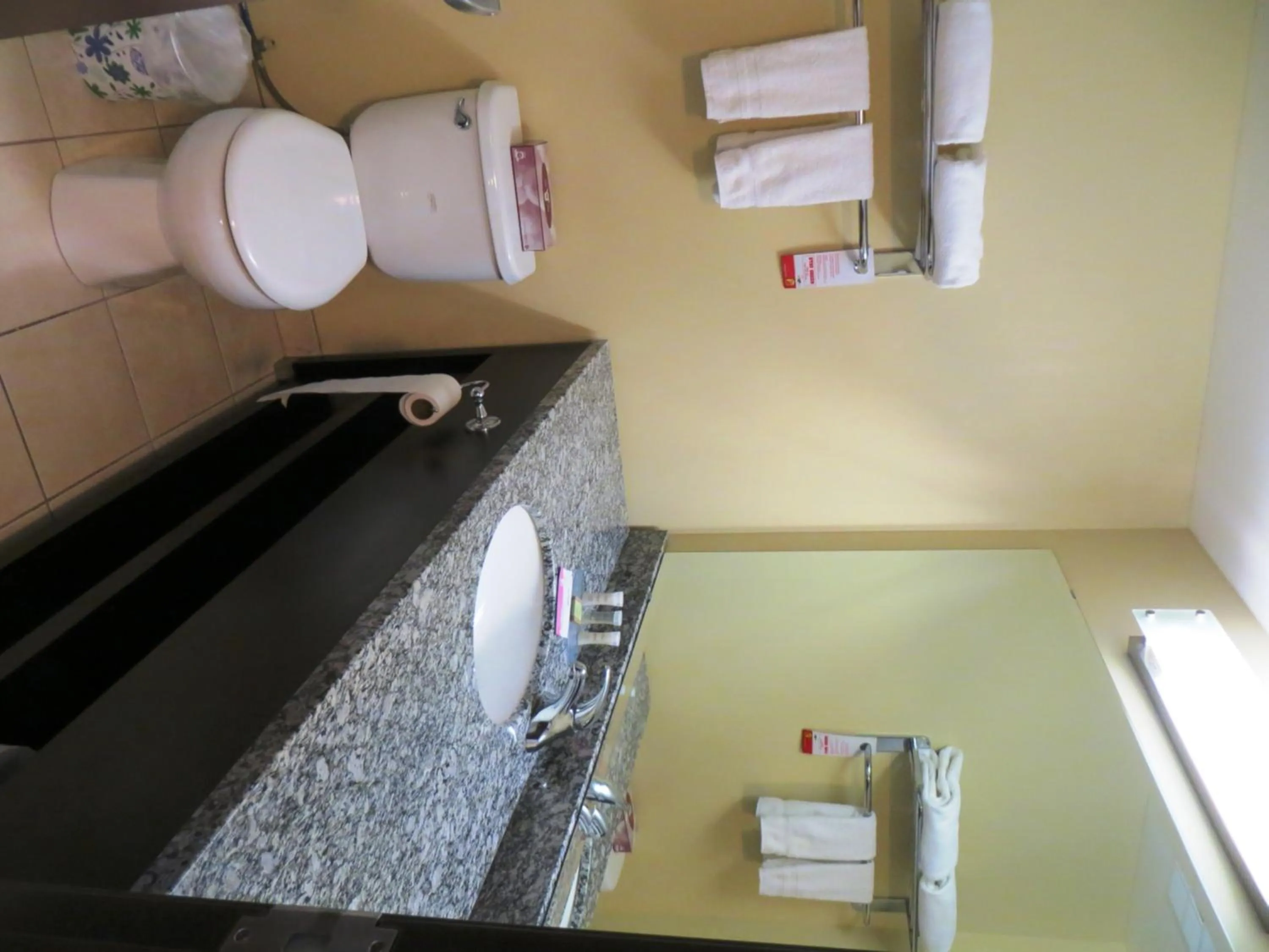 Bathroom in Super 8 by Wyndham Saskatoon Near Downtown