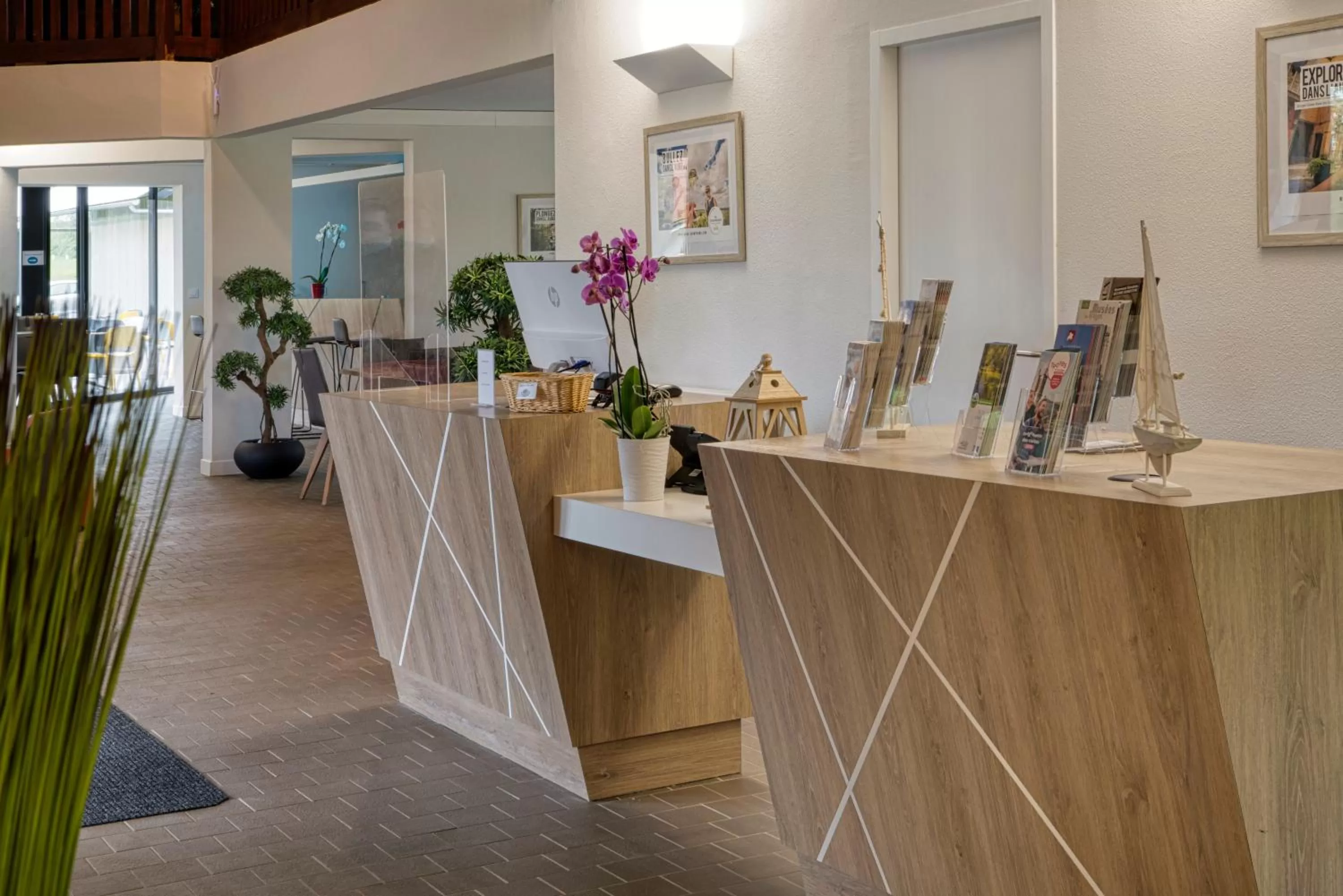 Lobby or reception in Hôtel Lac d'Orient