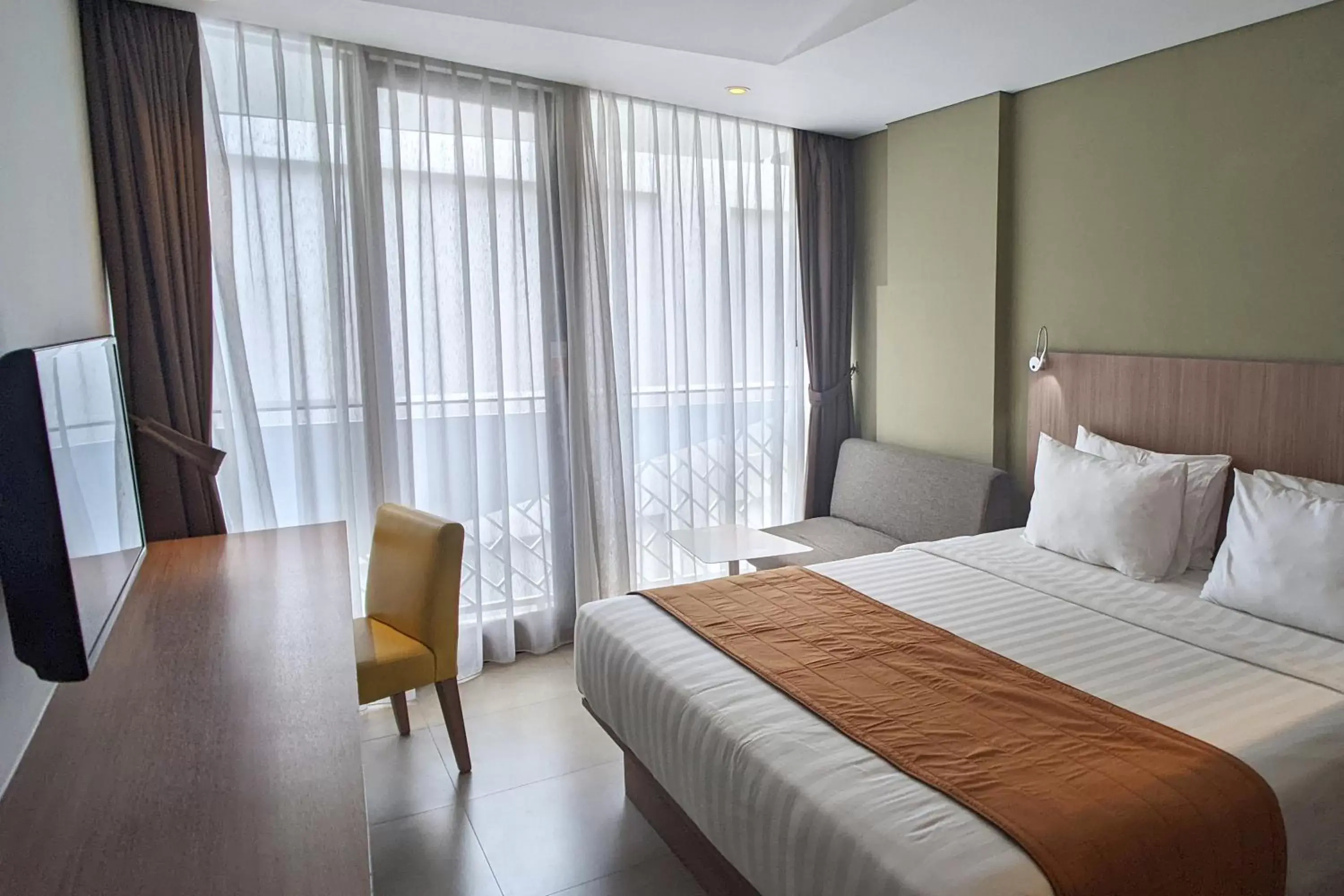 Deluxe King Room in Episode Kuta Bali Deluxe King Room in Episode Kuta Bali