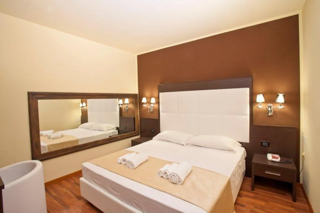 Photo of the whole room, Bed in Momi's Hotel