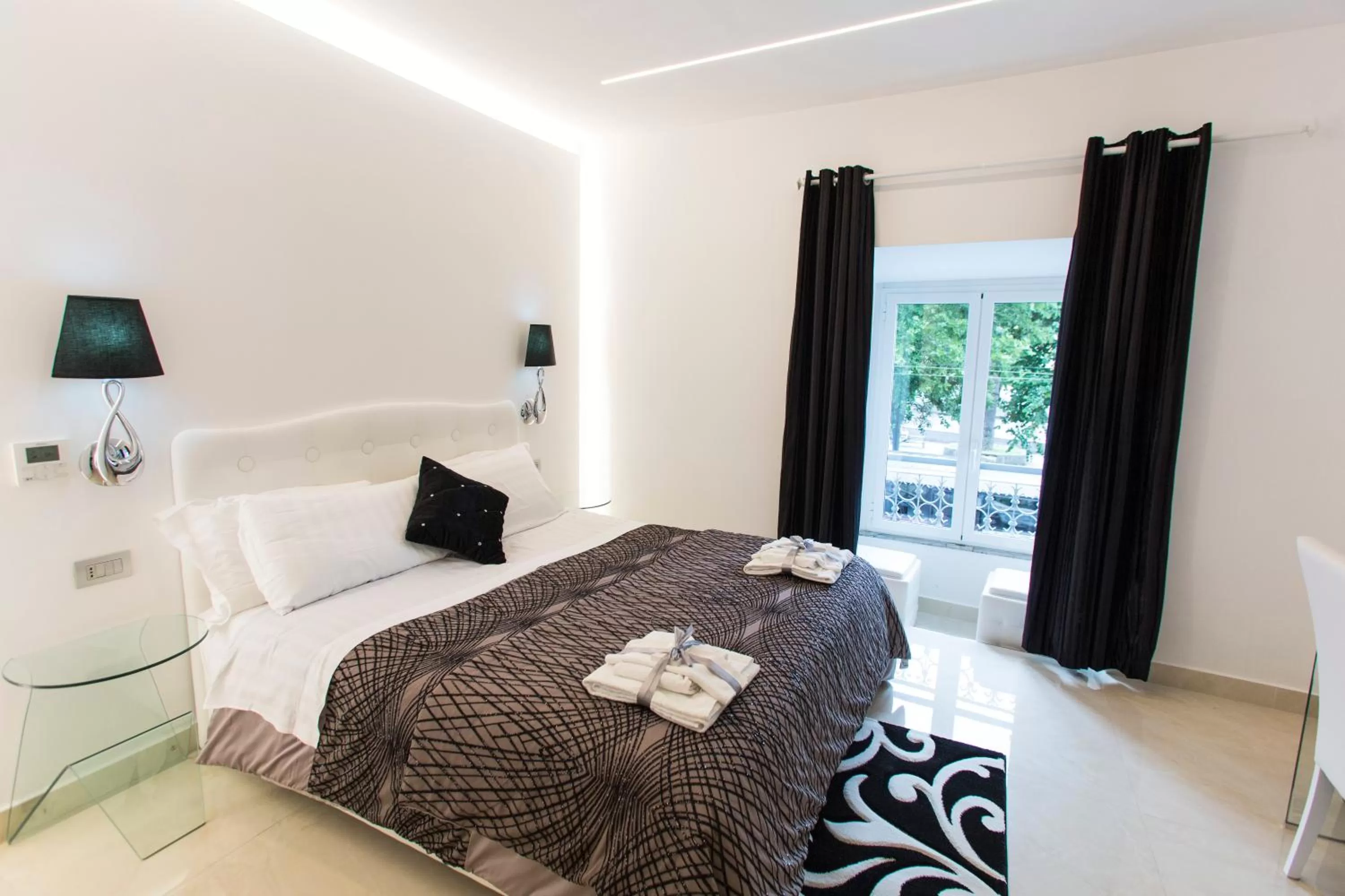 Bed in San Pietro Grand Suite