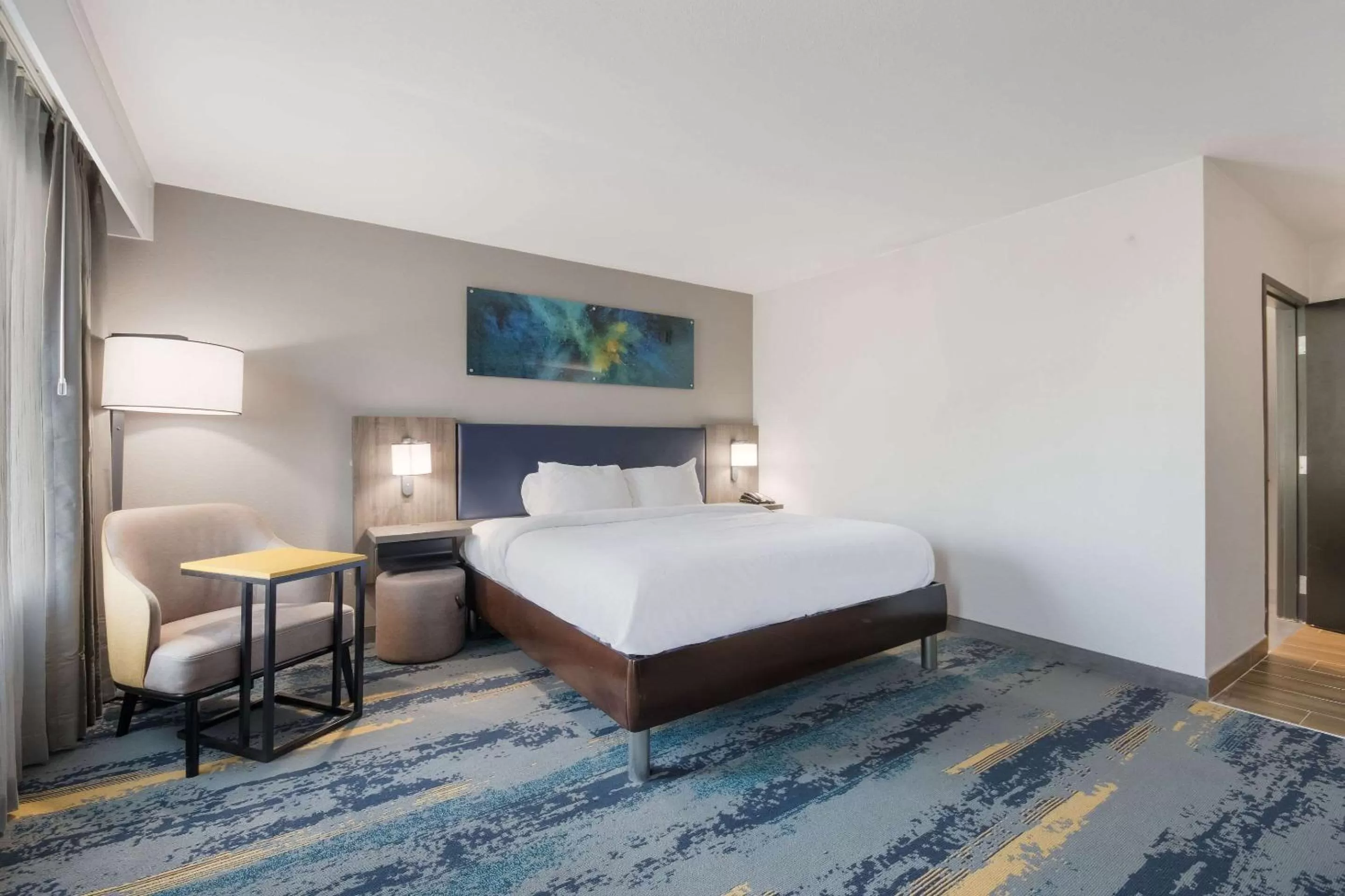 Bedroom in Clarion Pointe OKC Airport