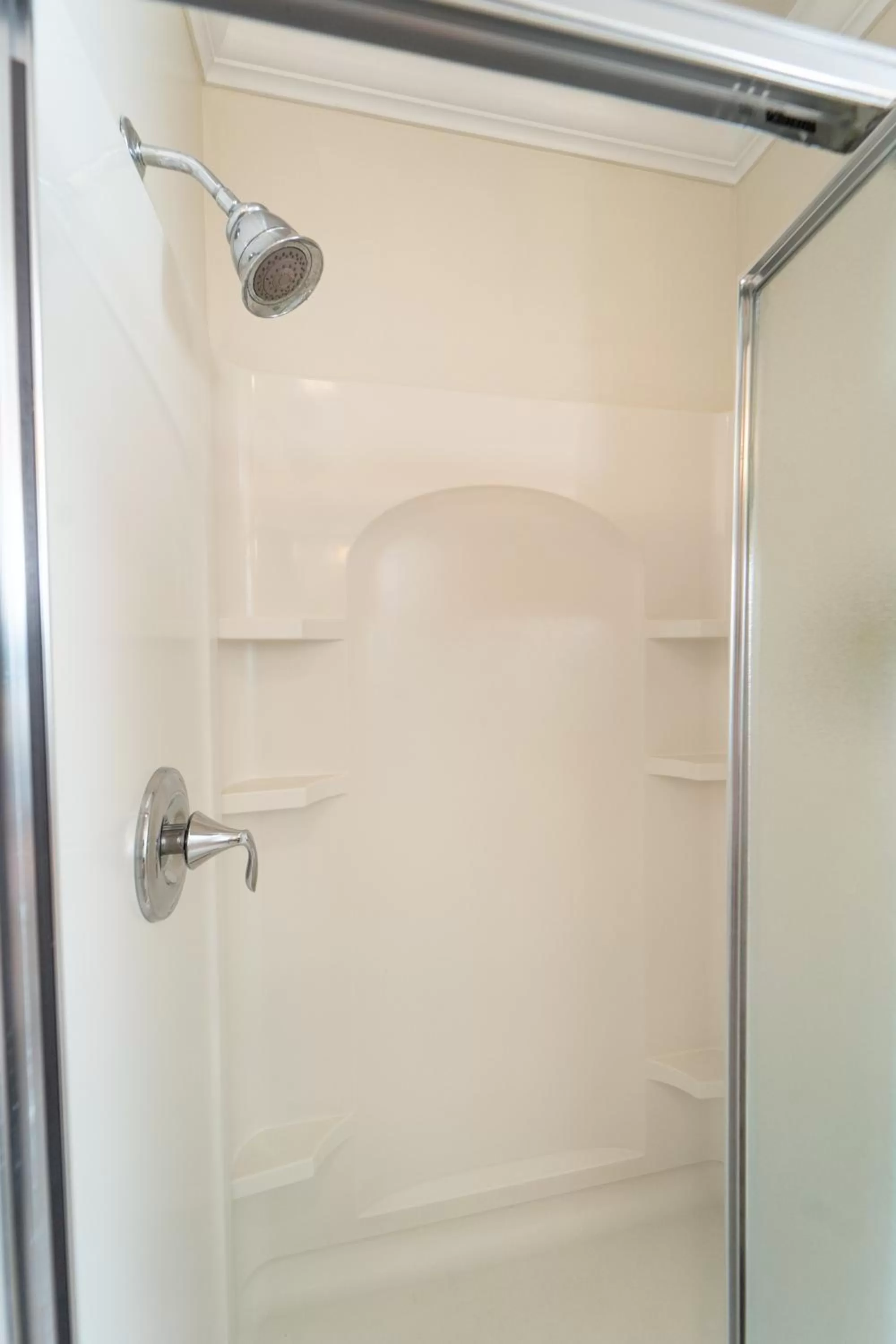 Shower in Holiday Inn Resort Grand Cayman by IHG