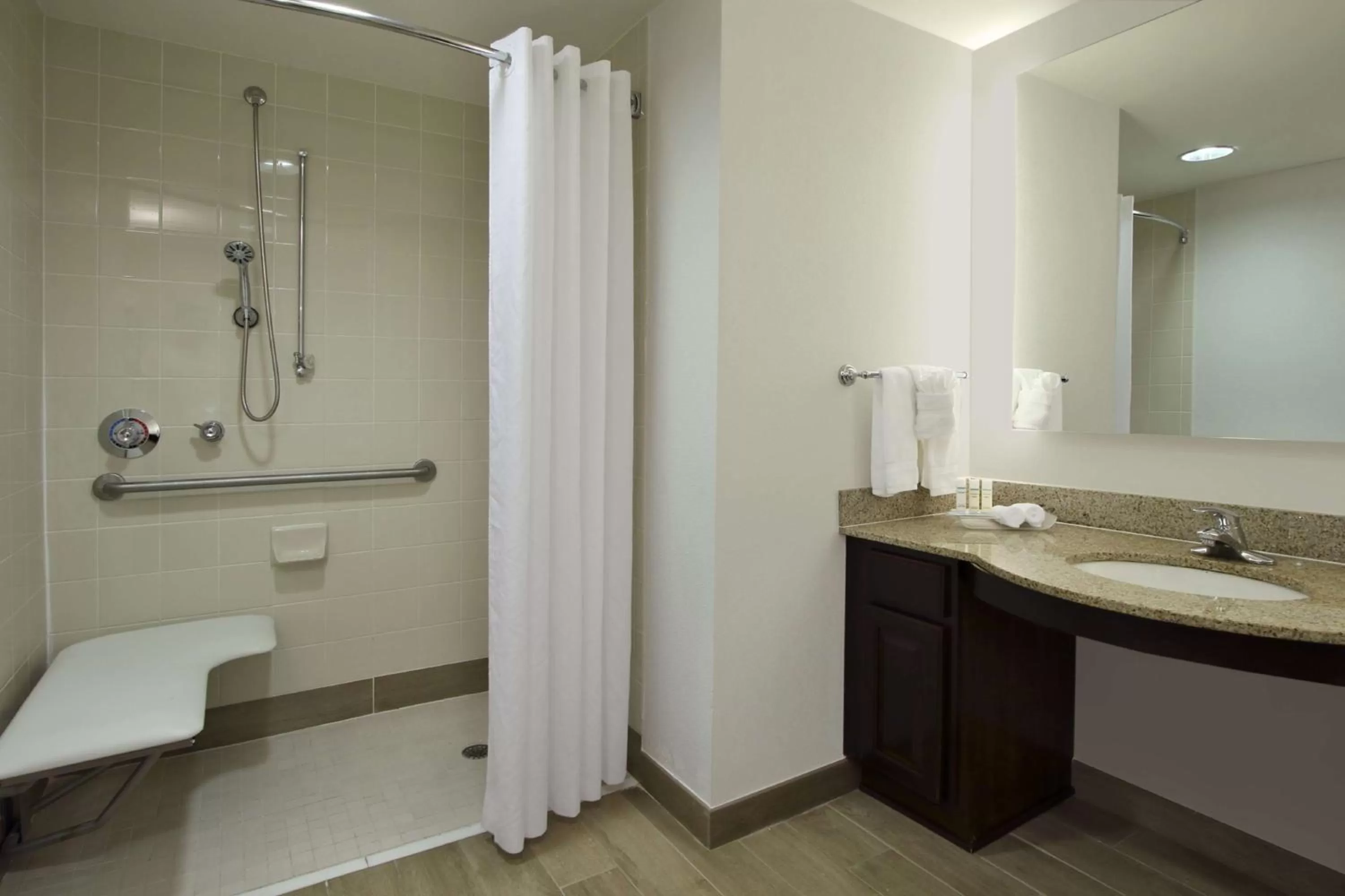 Bathroom in Homewood Suites by Hilton Miami - Airport West