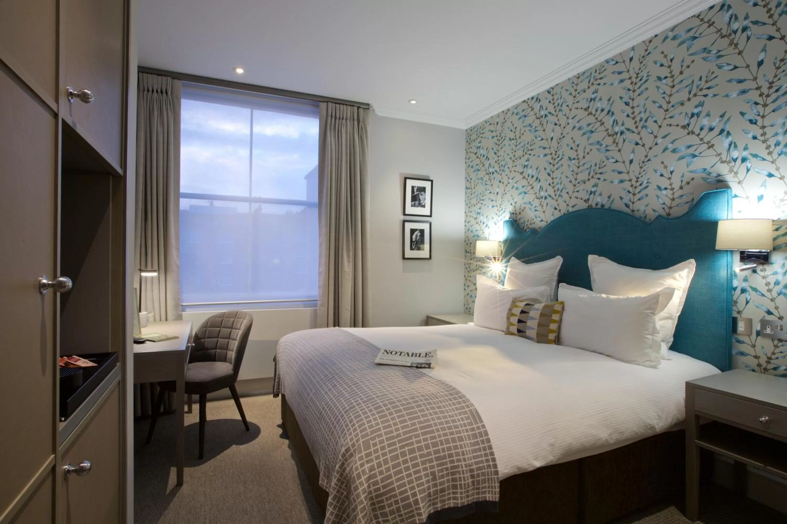 Bed in 54 Queen's Gate Hotel