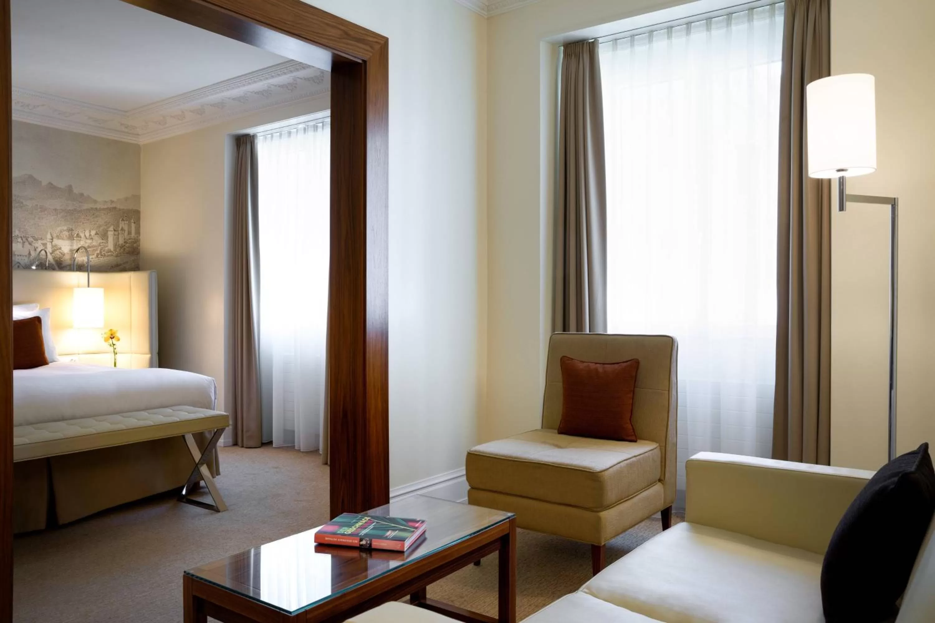 Living room, Bed in Renaissance Lucerne Hotel