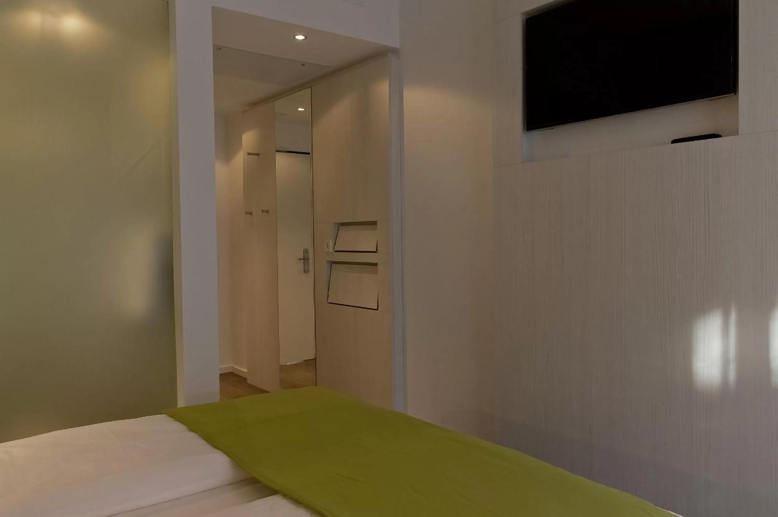 Decorative detail, Bed in Super 8 by Wyndham Munich City North