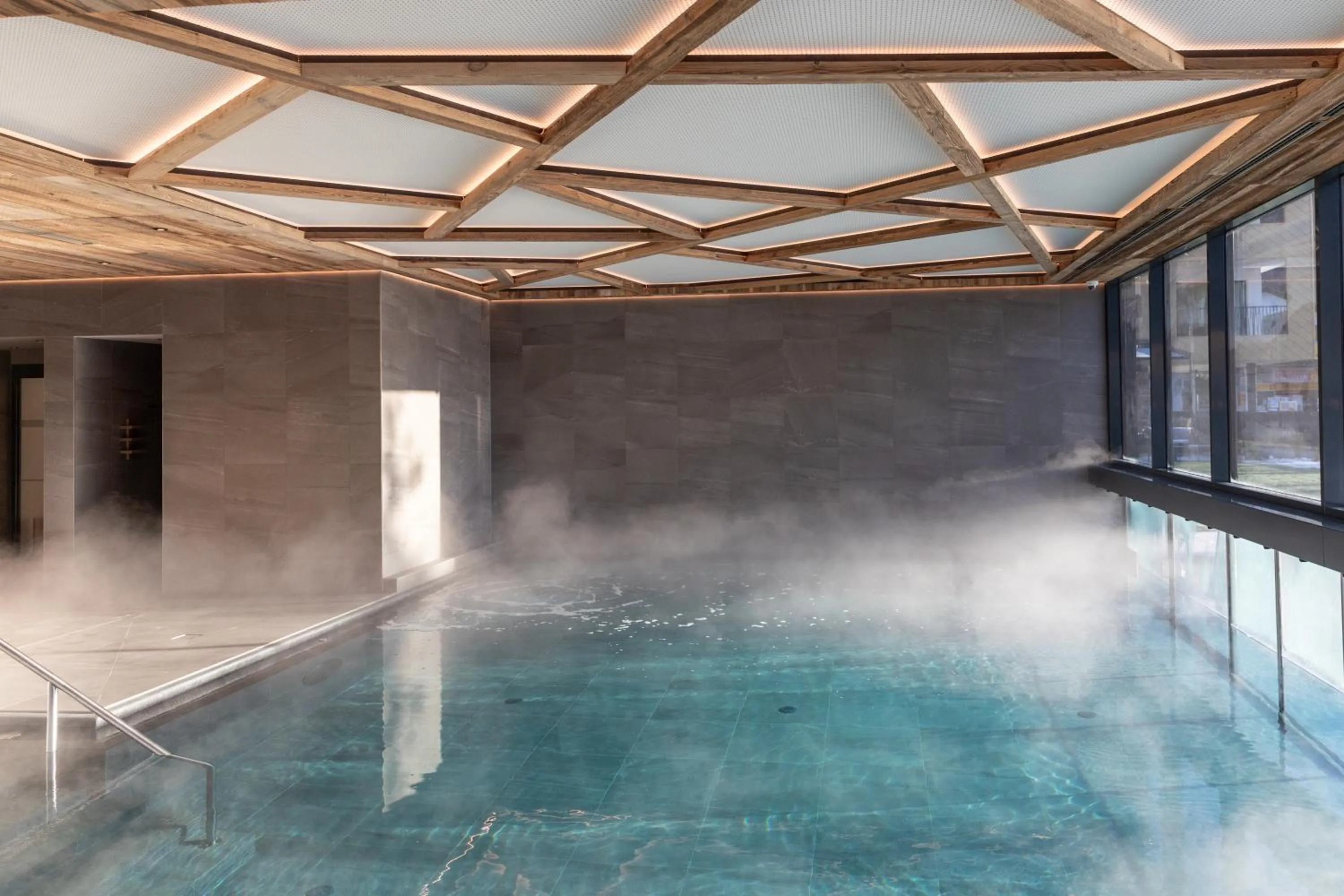 Swimming pool in Hotel Seespitz Superior - Adults Only