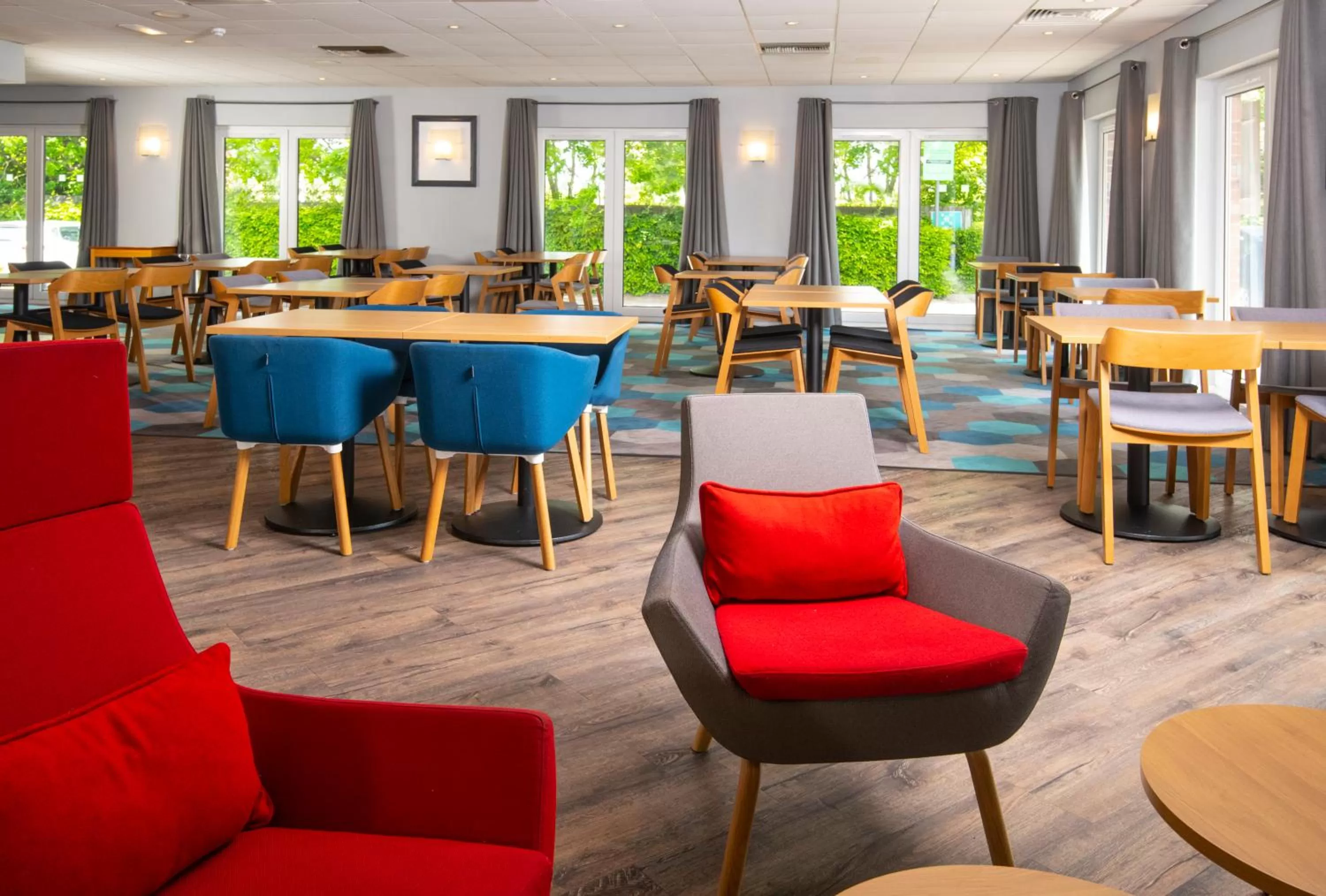 Dining area in Holiday Inn Express Peterborough by IHG