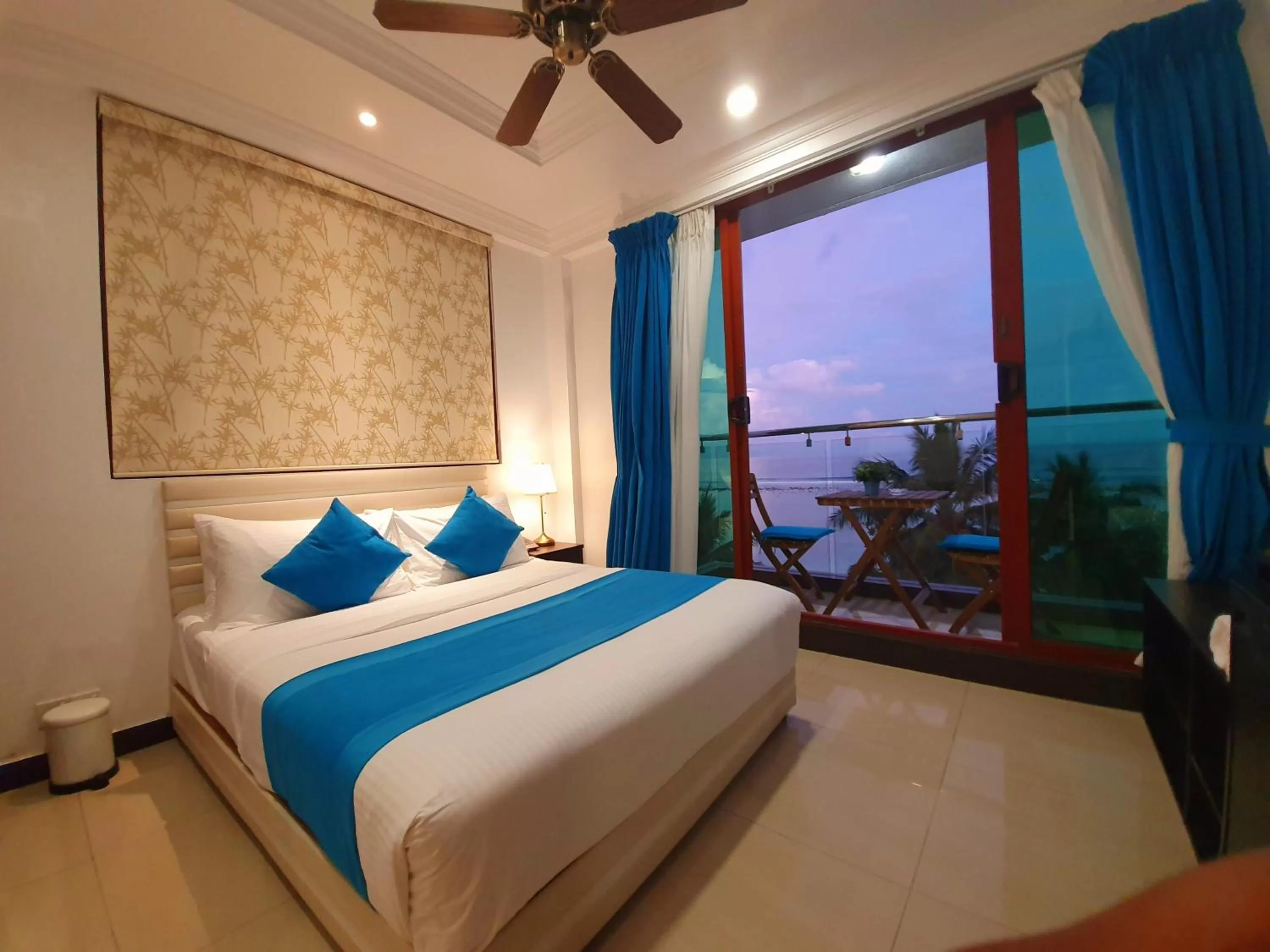 Photo of the whole room, Bed in Huvan Beach Hotel at Hulhumale