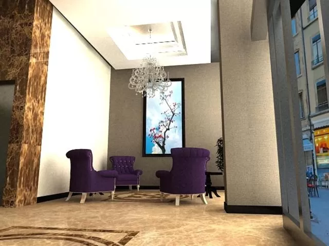 Communal lounge/ TV room in Sahinbey Hotel