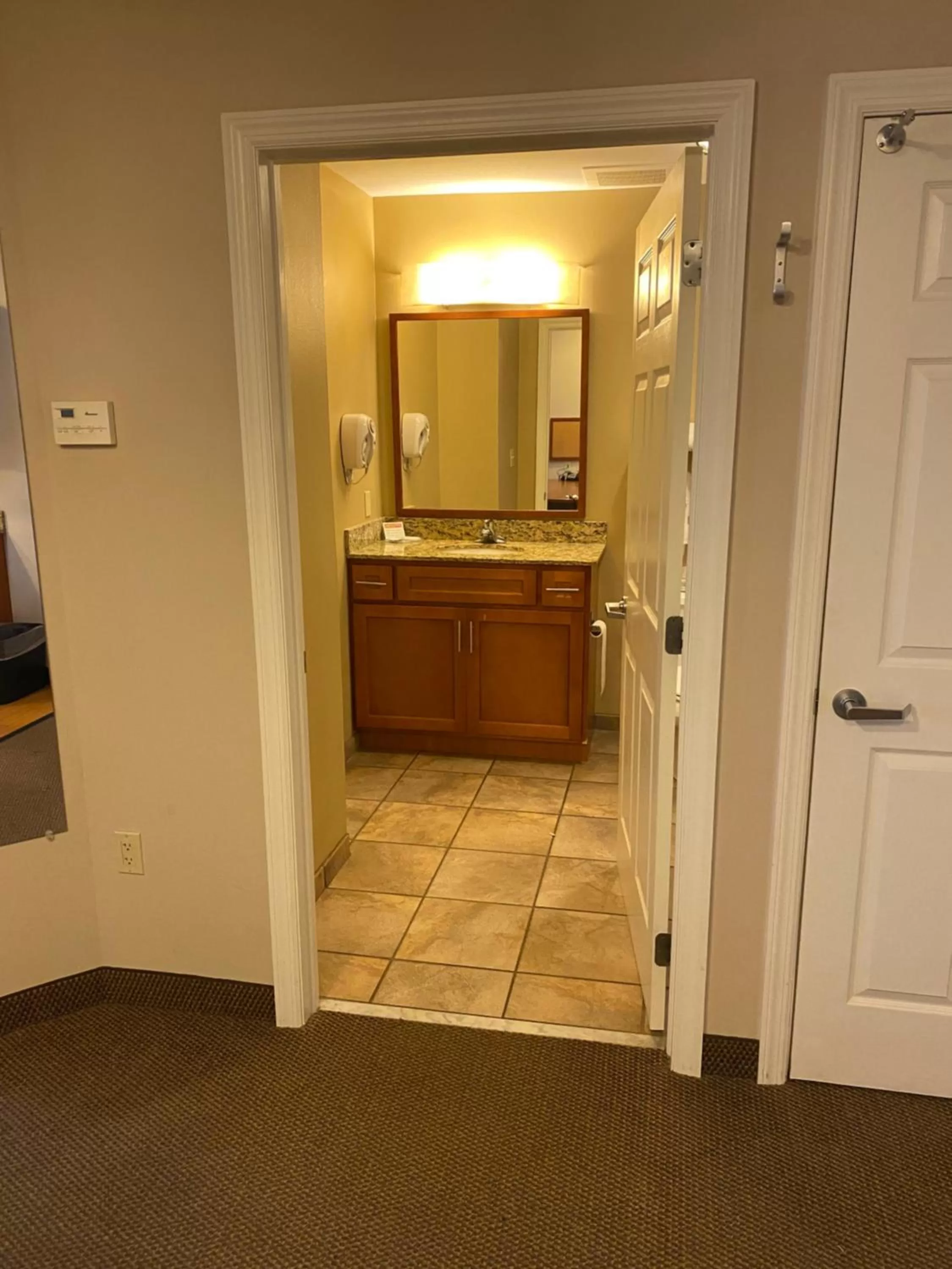 Bathroom in Candlewood Williamsport by IHG
