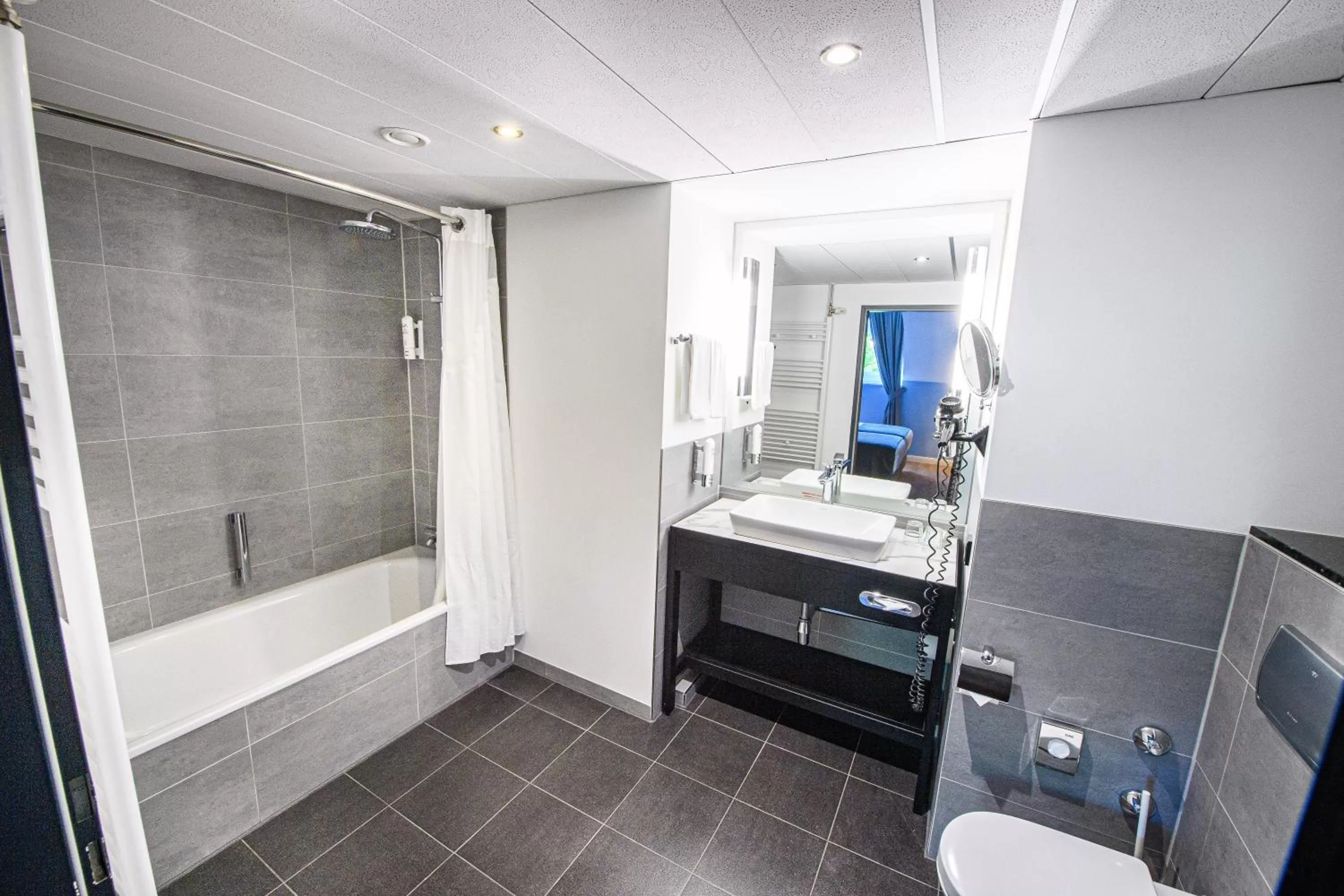 Bathroom in Holiday Inn Lübeck by IHG