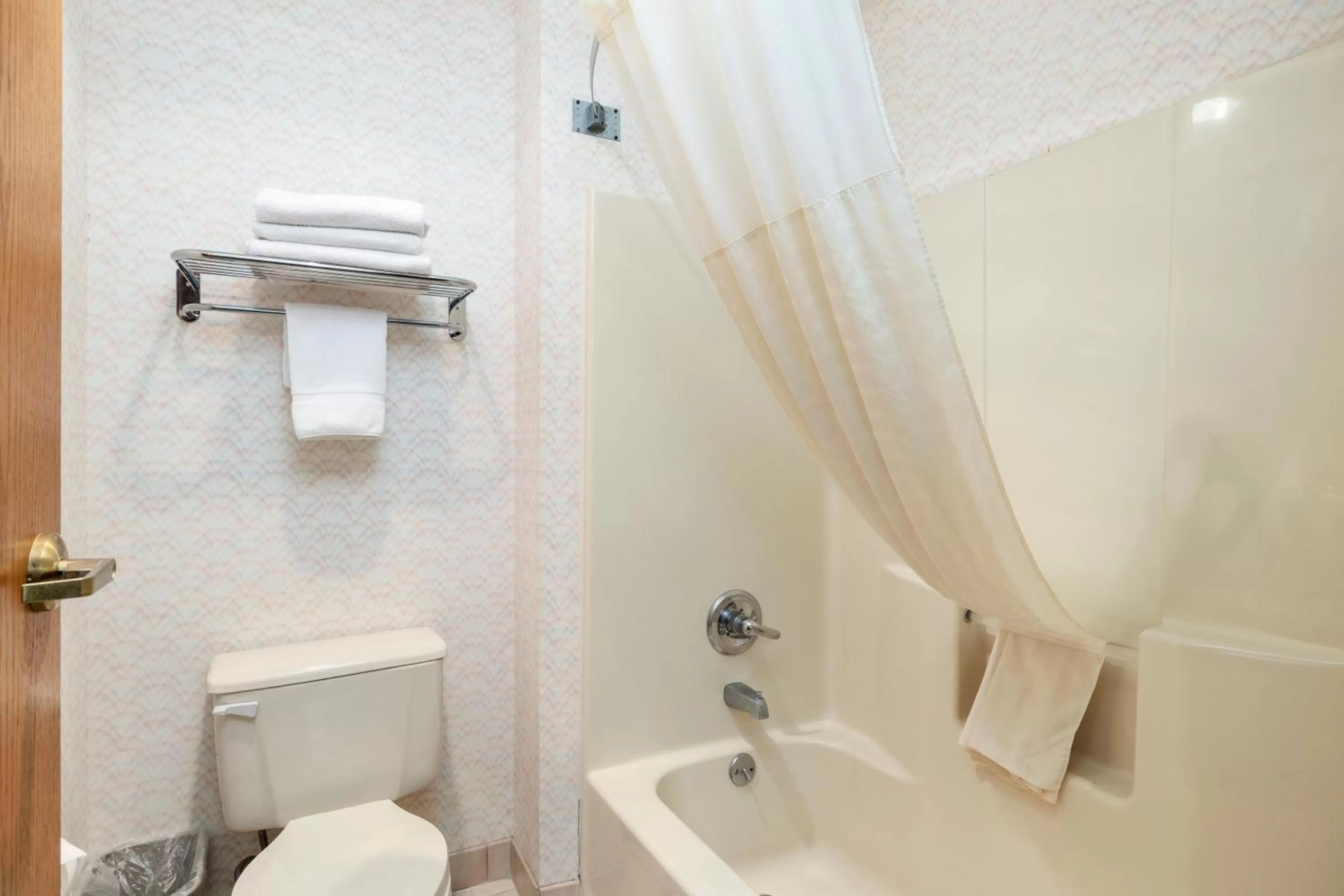 Bathroom in Days Inn by Wyndham Battlefield Rd/Hwy 65