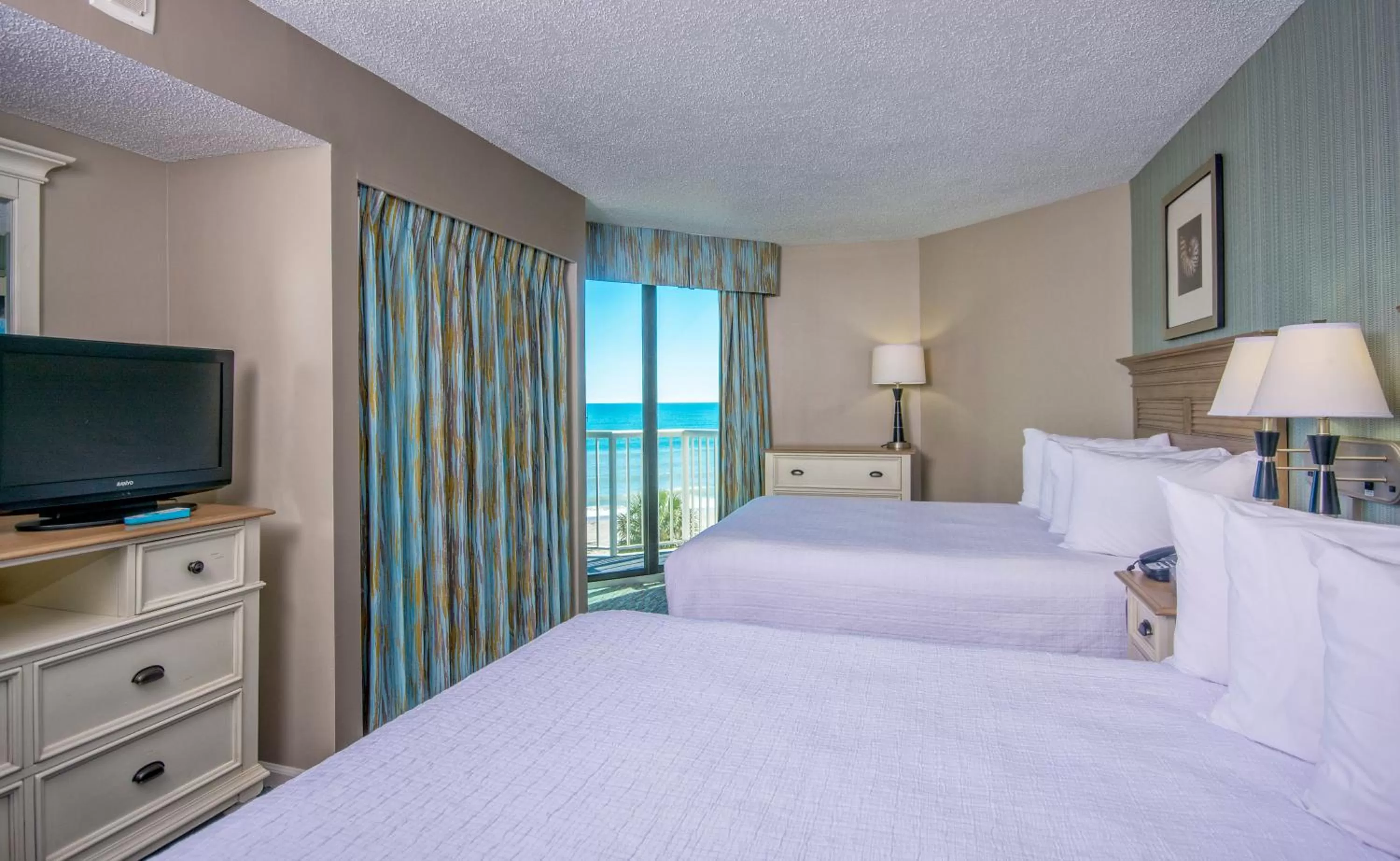 Bedroom, Bed in The Strand - A Boutique Resort