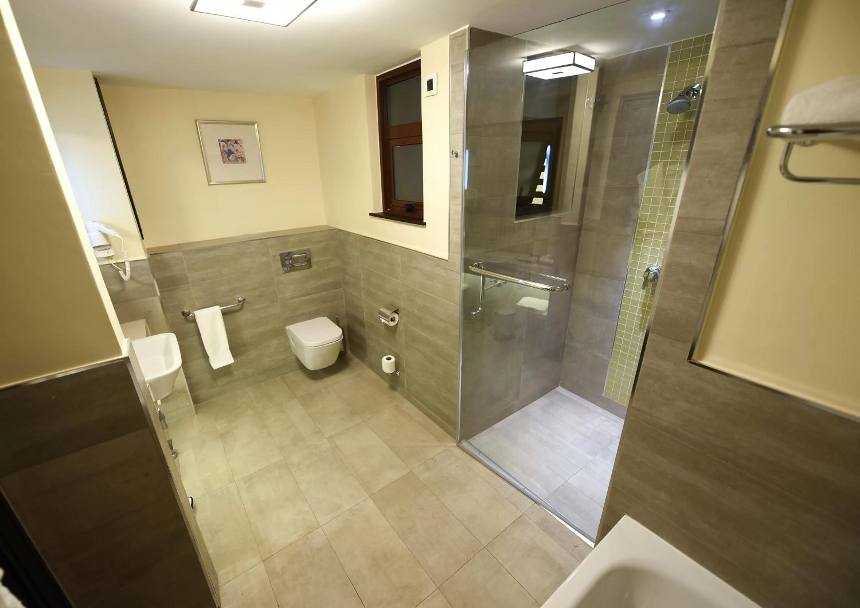 Shower in Mestil Hotel & Residences