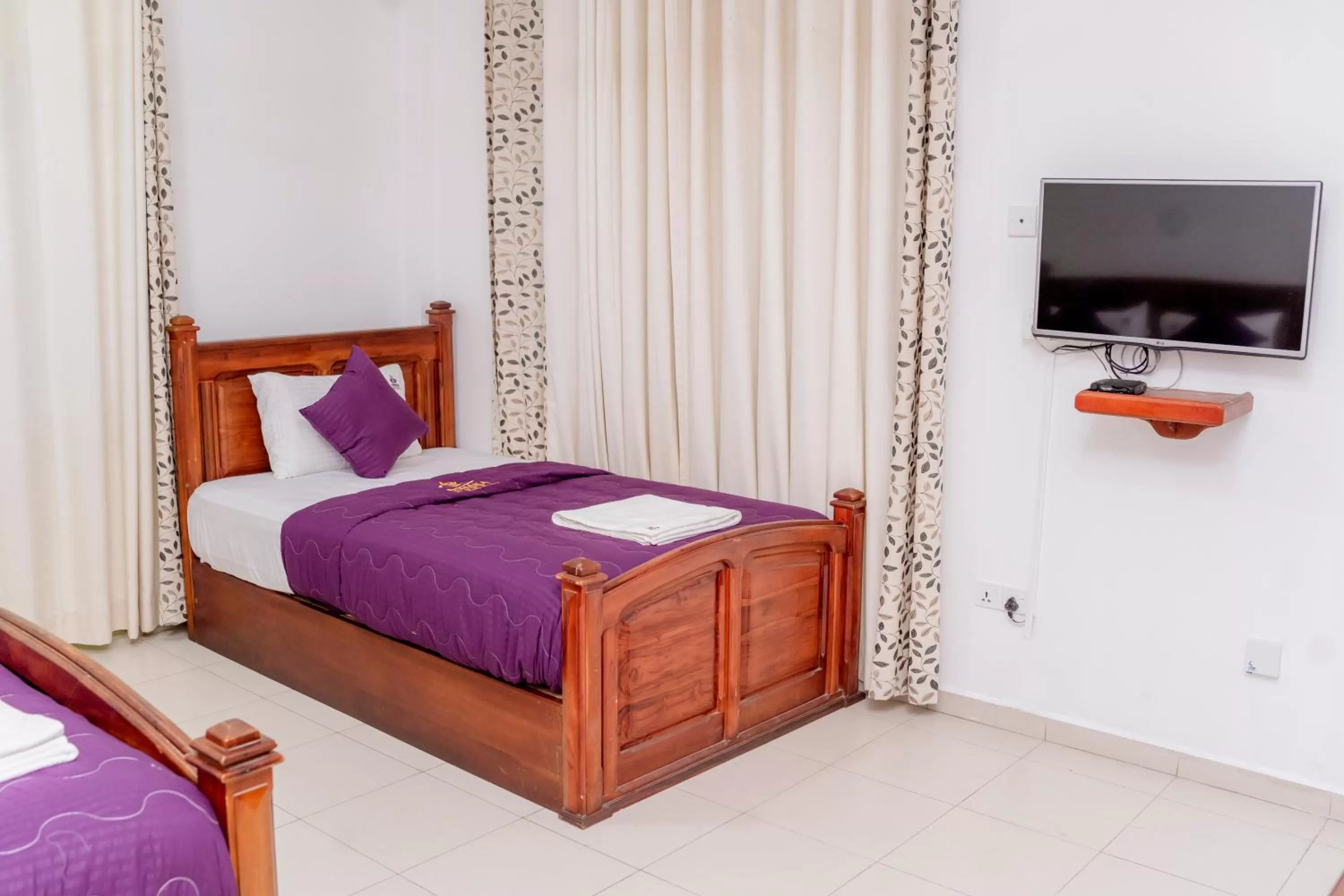 Bed in Ronaka Airport Transit Hotel