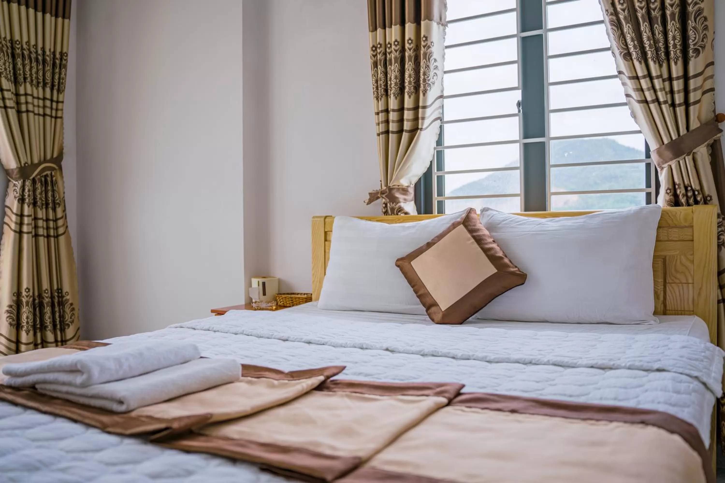 Bed in Phú Xuân Hotel