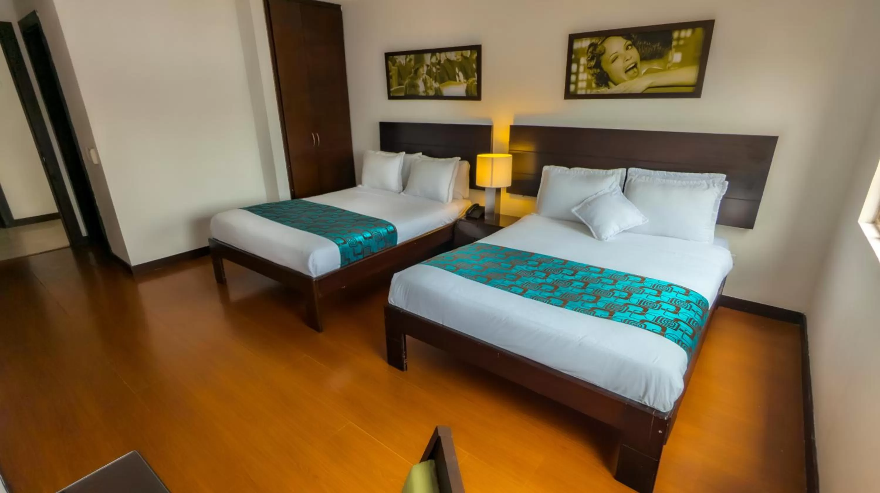 Bed in Hotel Charlotte Suite 26