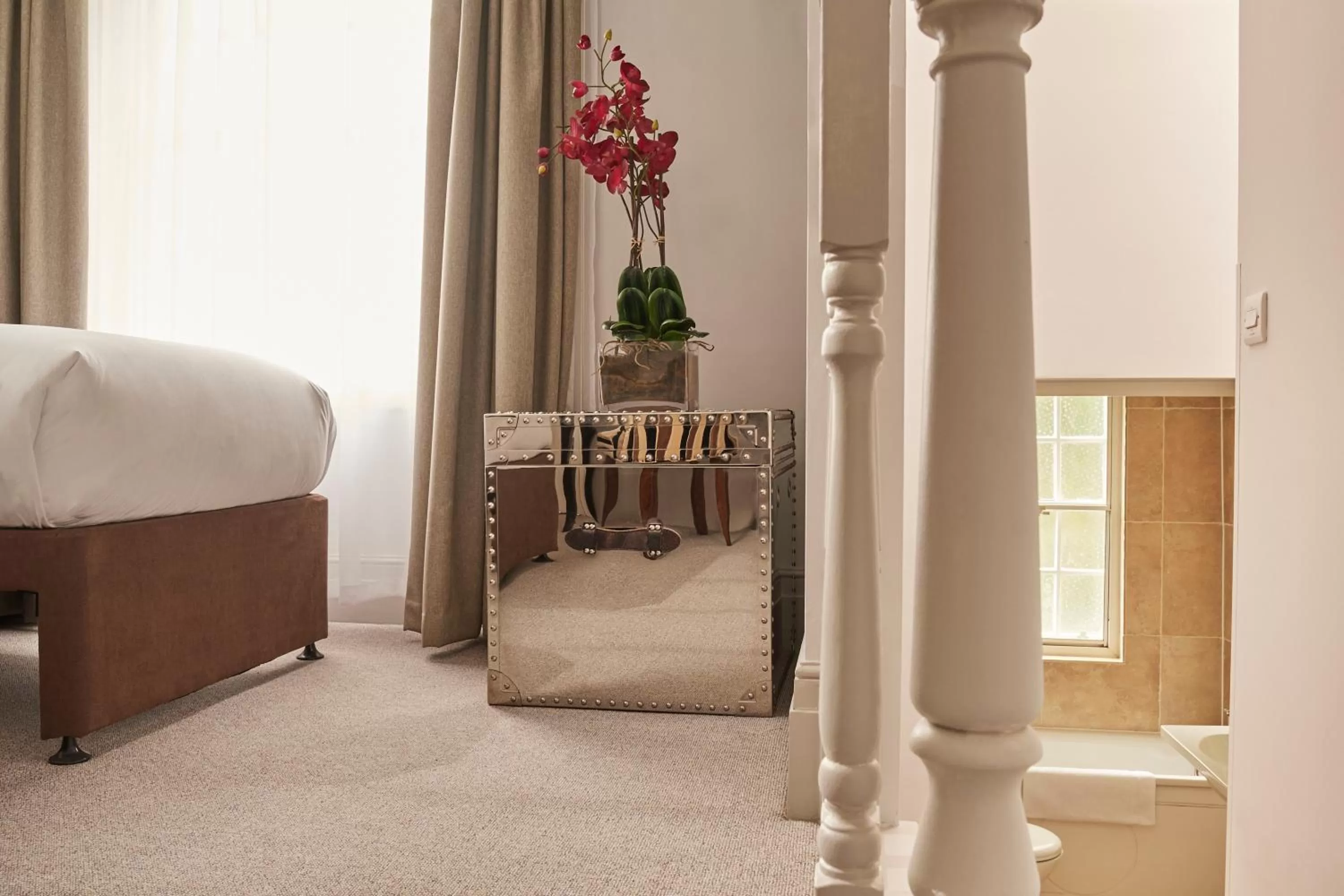 Decorative detail, Bed in The Tophams Hotel