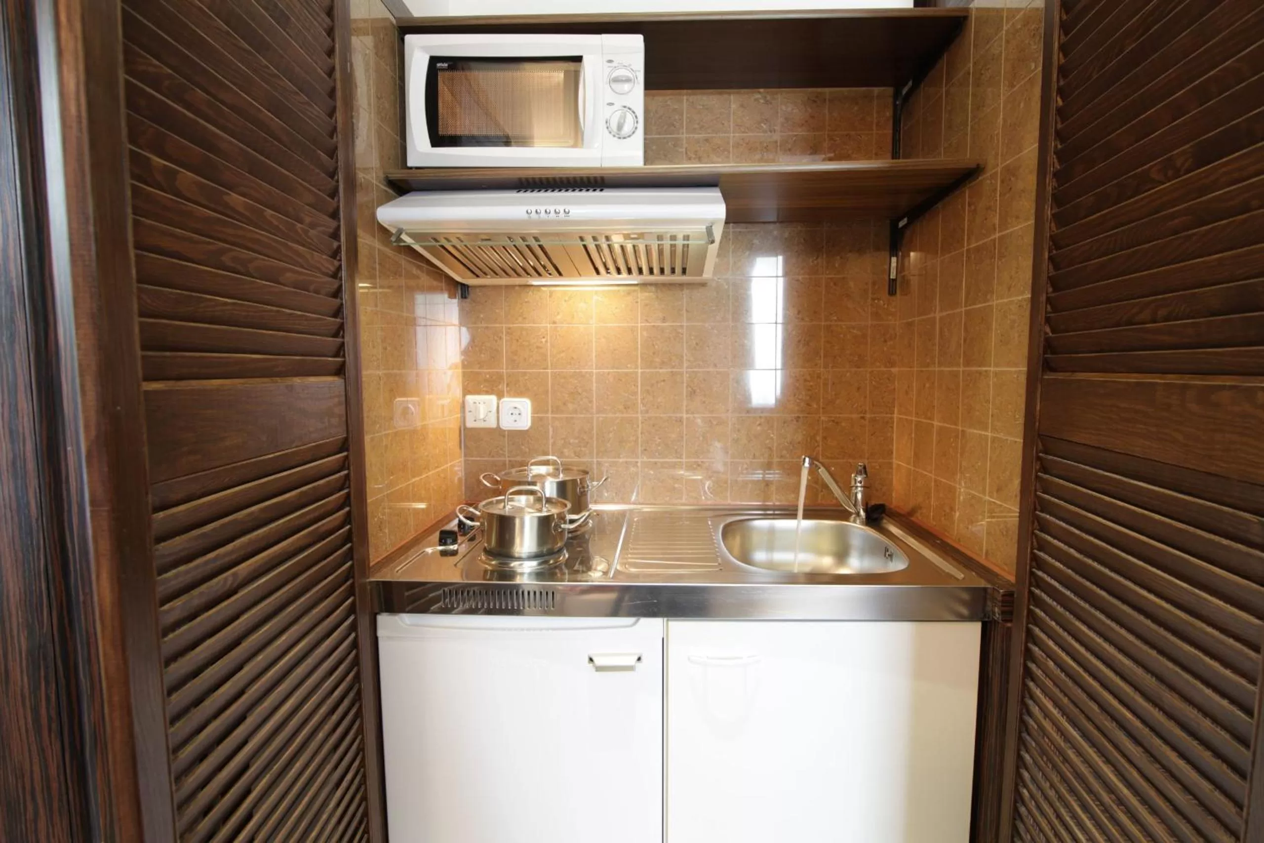 Kitchen or kitchenette in Best Western Plus Hotel Arcadia