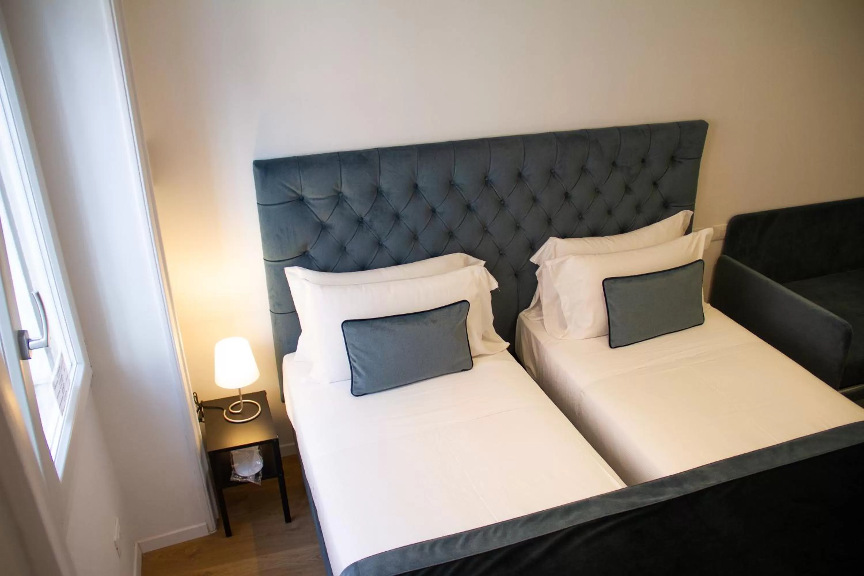 Bed in Michelangelo Vatican Rooms