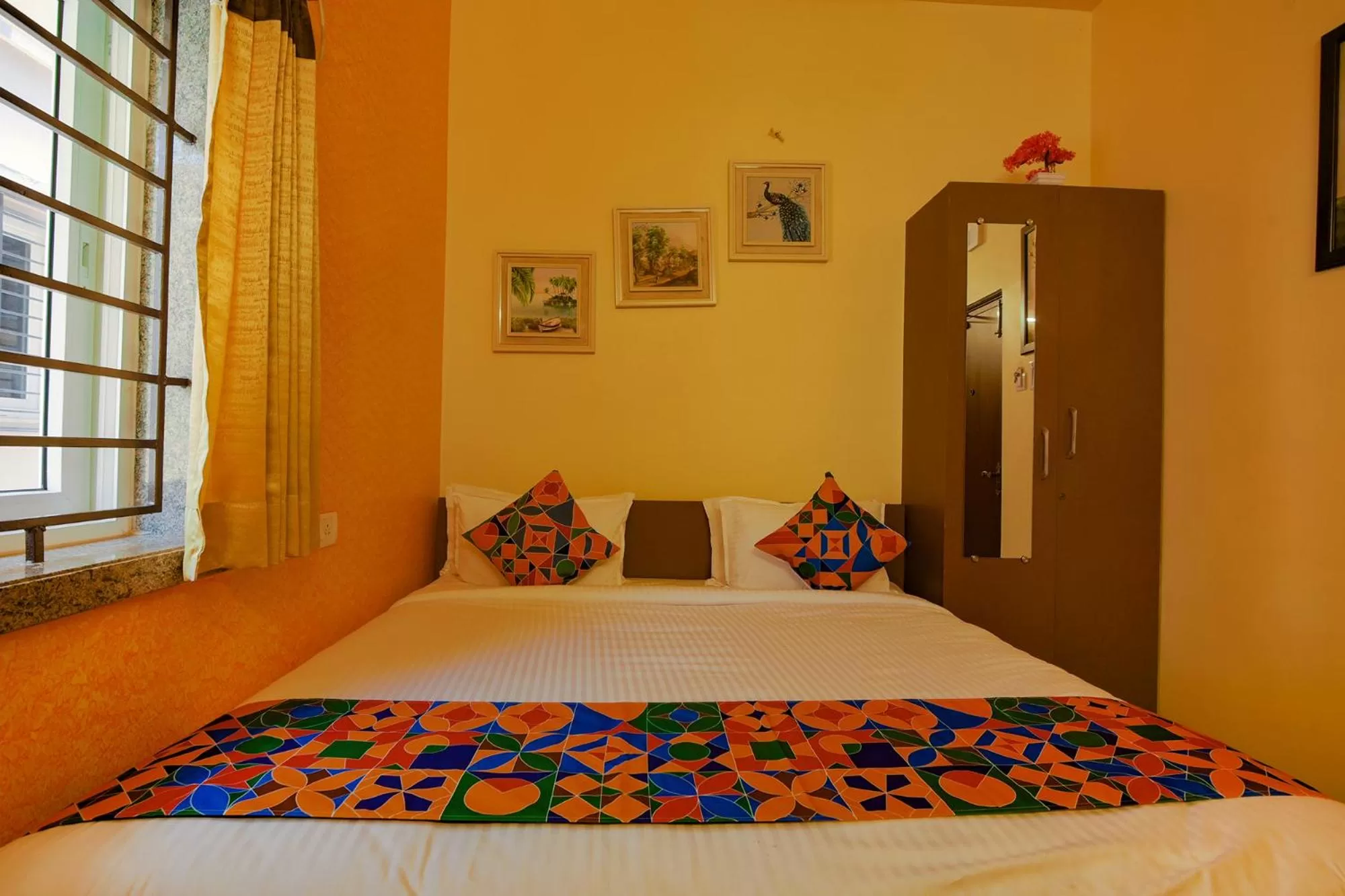 Bed in FabHotel Vijaylakshmi Stay Inn